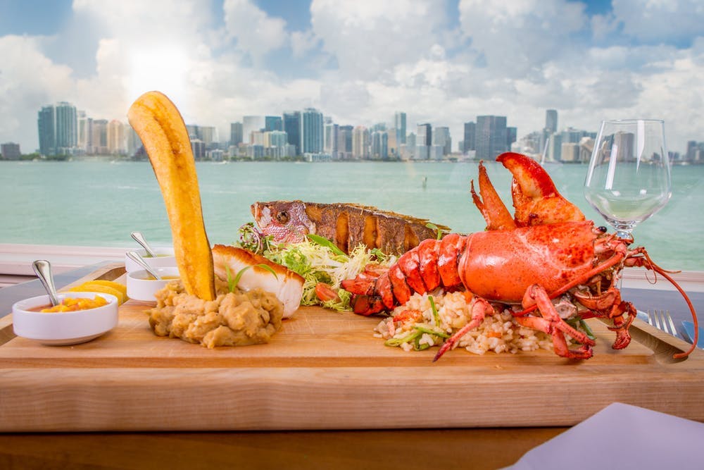 a lobster on a wooden table