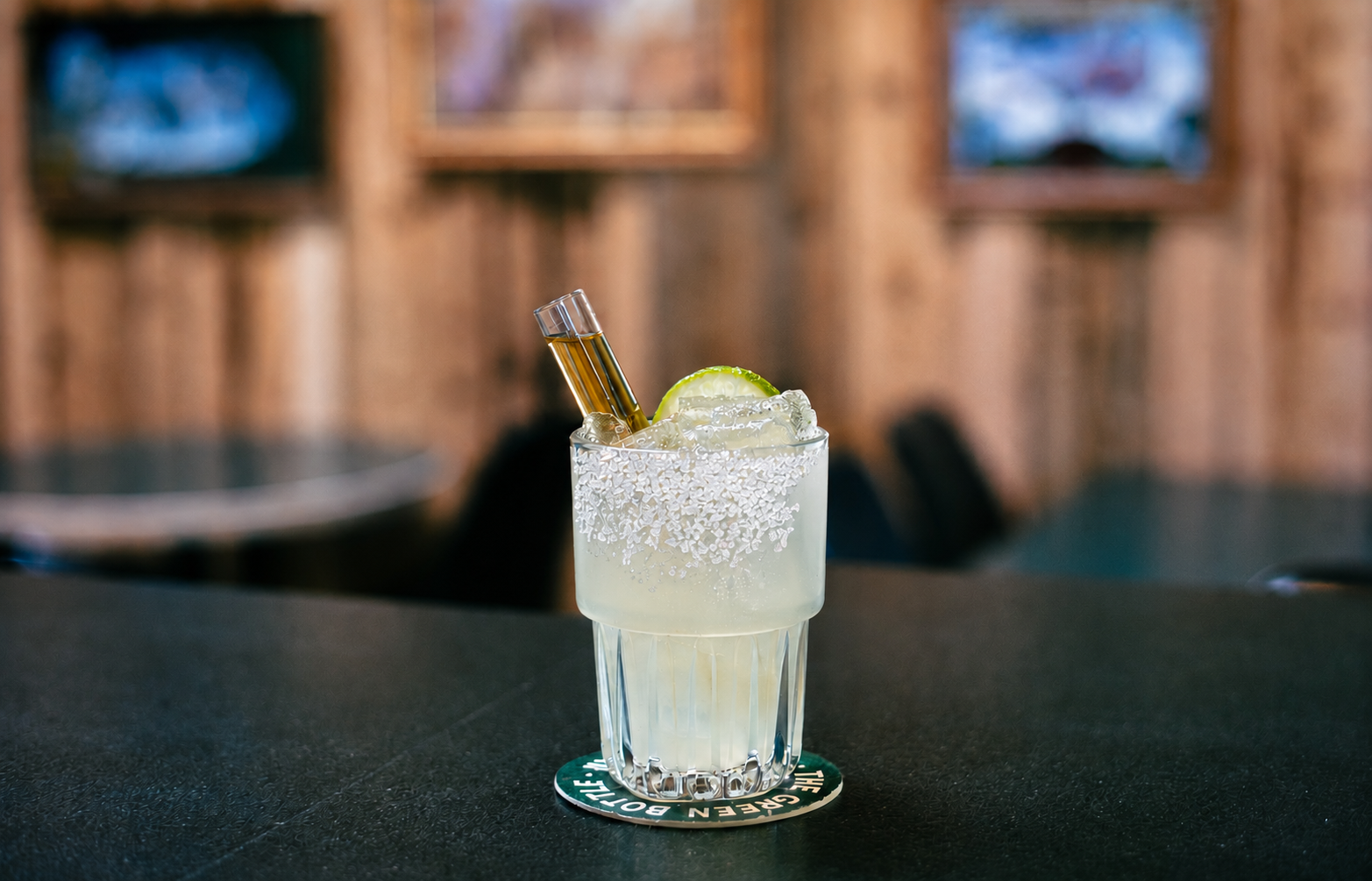 a glass with a drink in it