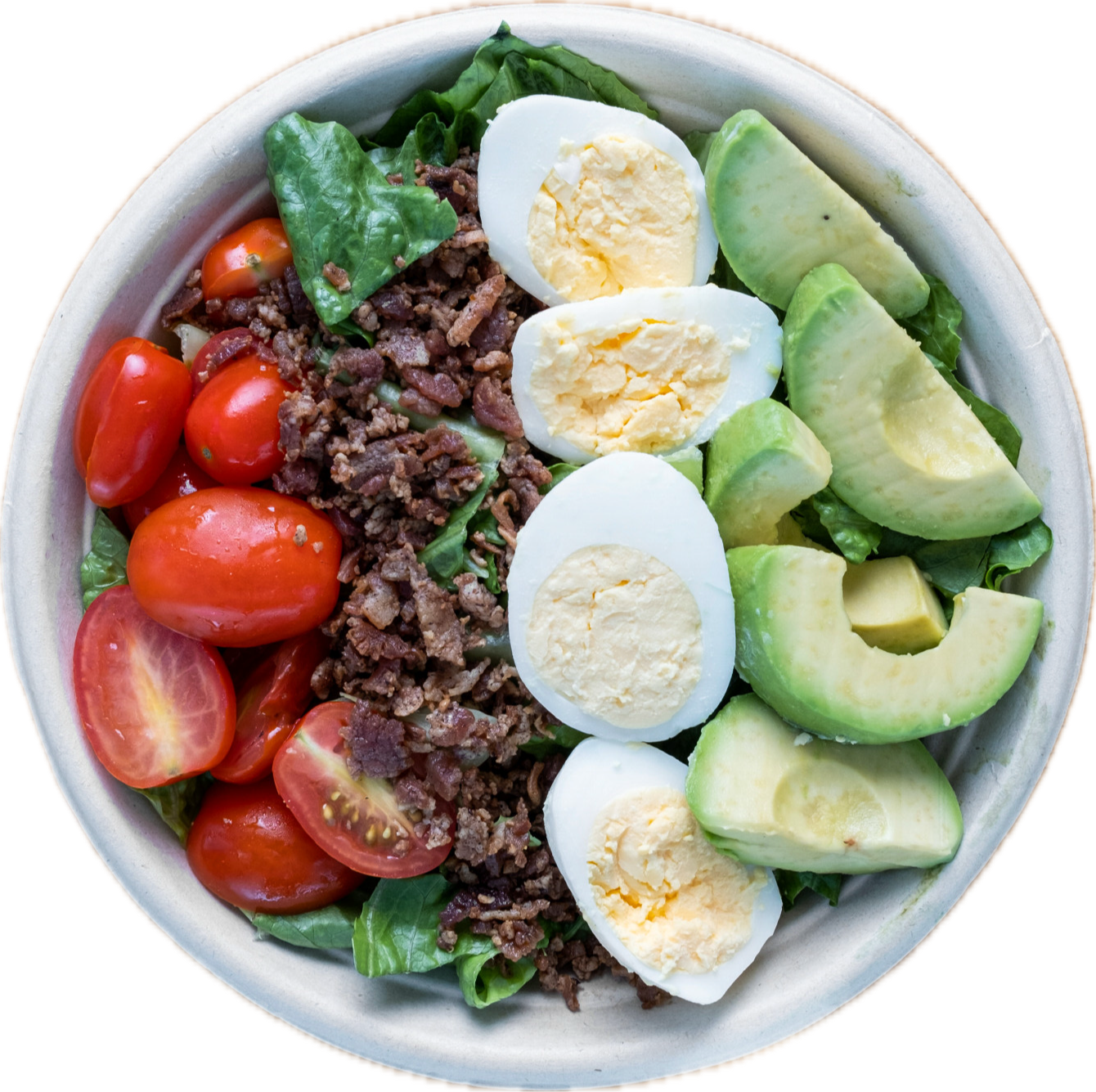 a bowl filled with different types of food on a plate