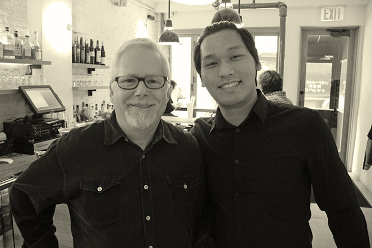 two men smiling