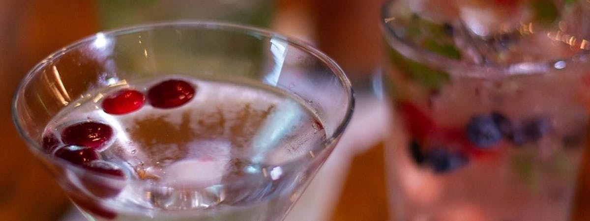 a close up of a glass cup on a table