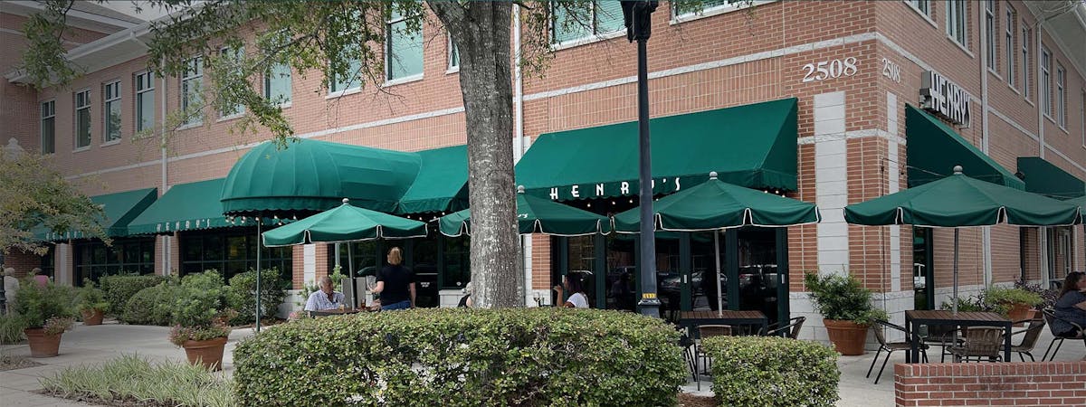 a building with a green umbrella