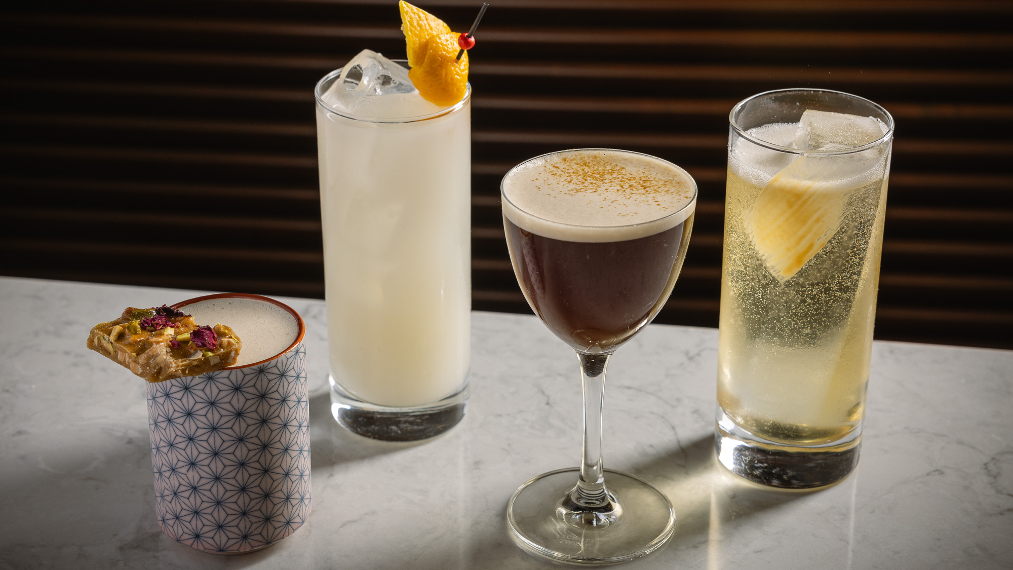 a cup of coffee and a glass of beer on a table