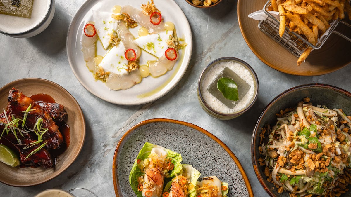 a bowl filled with different types of food on a table