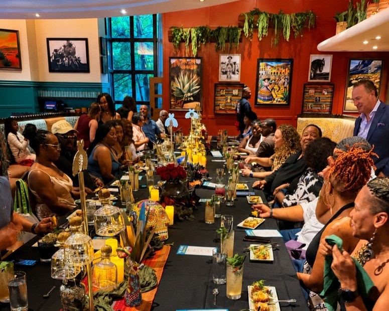 a group of people sitting at a table