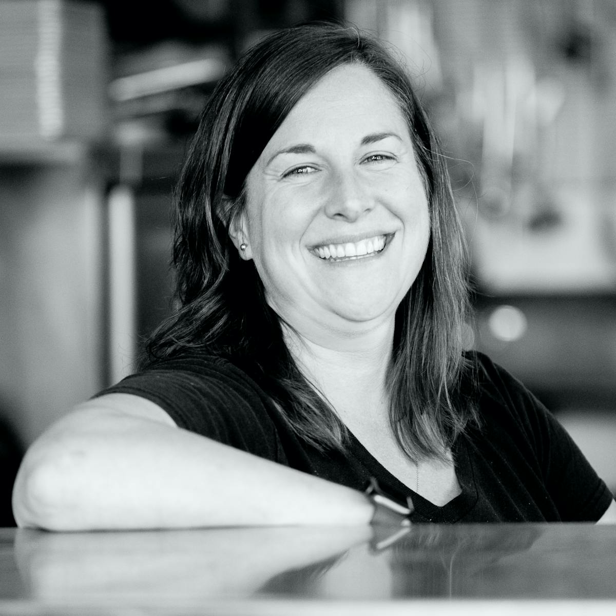a woman smiling for the camera