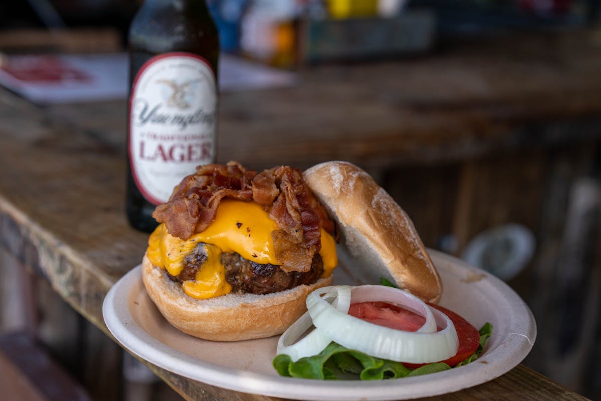 a sandwich sitting on top of a wooden table