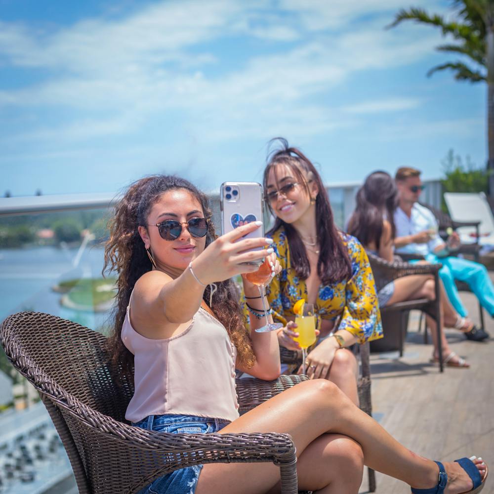 a woman sitting on a bench