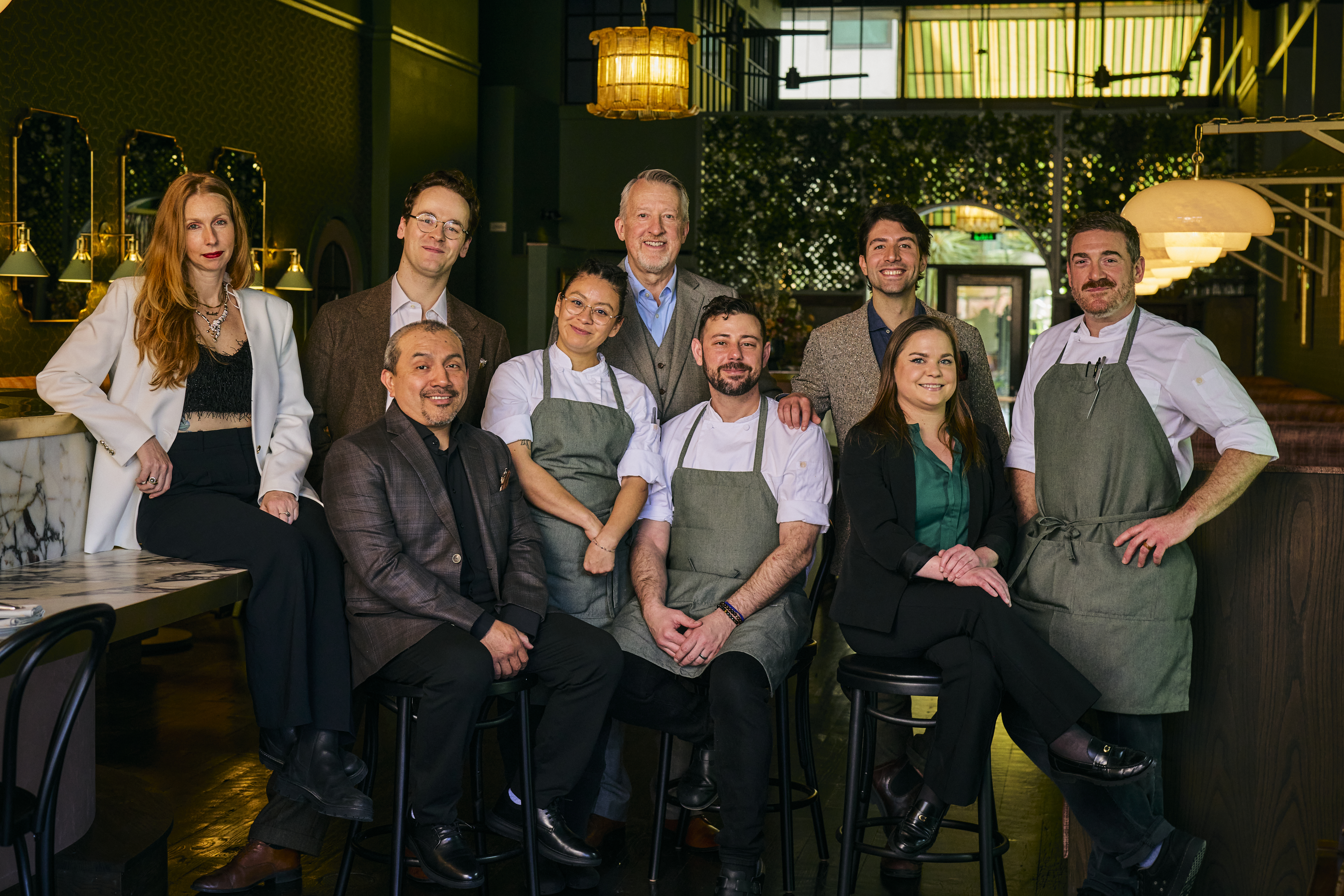 A group photo of all of the management staff at JouJou.