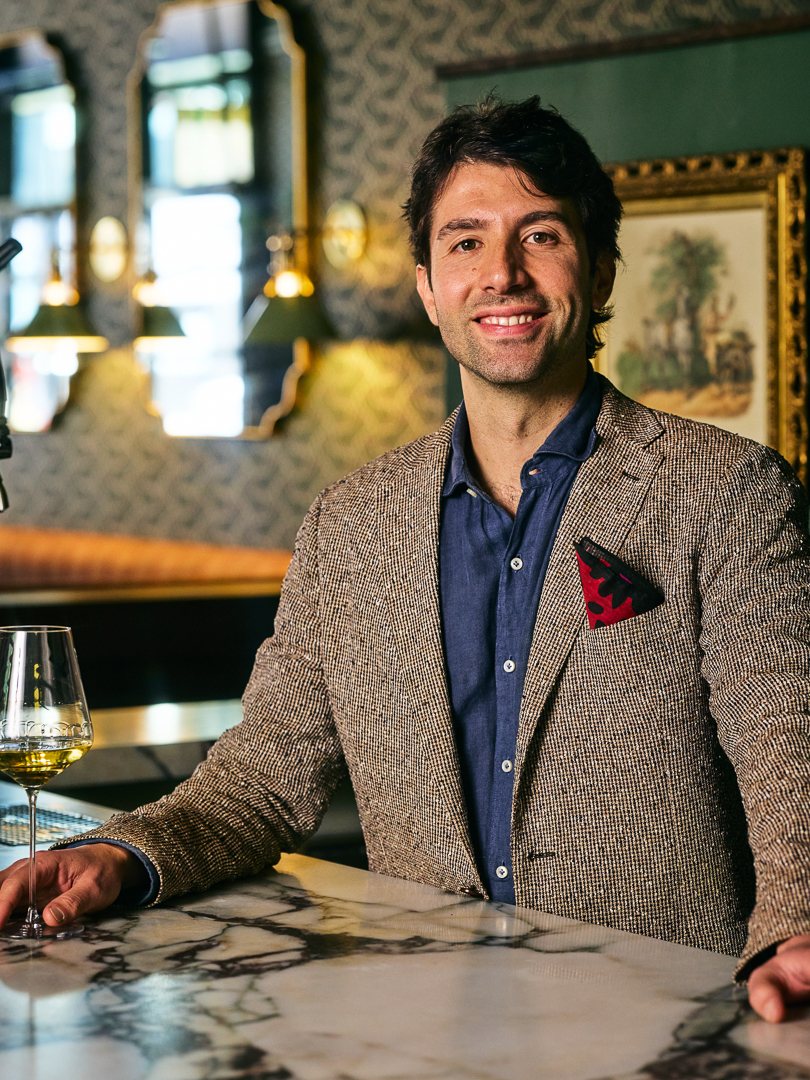 a man sitting at a bar