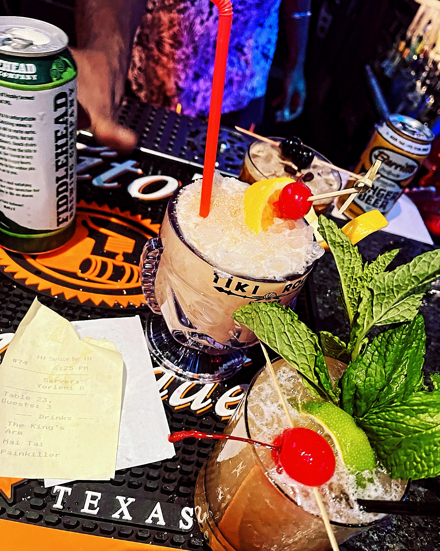 a bottle of items on a table