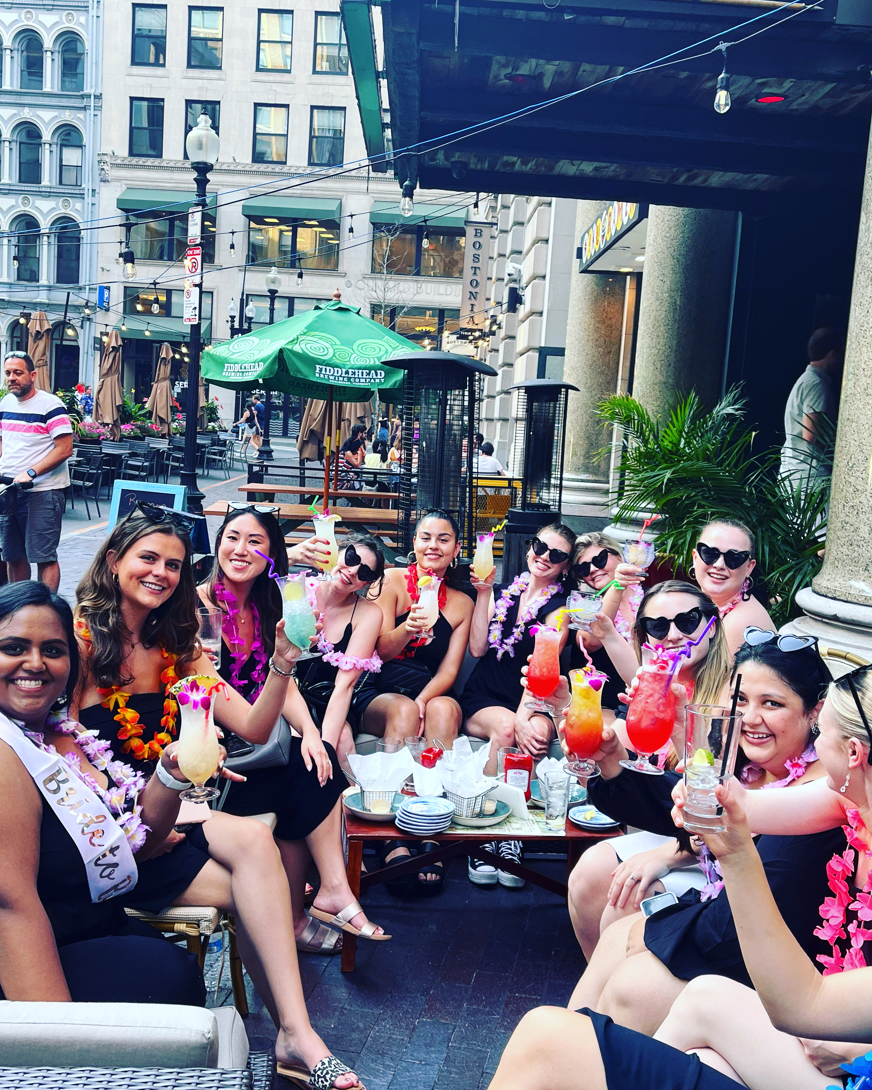 a group of people sitting posing for the camera