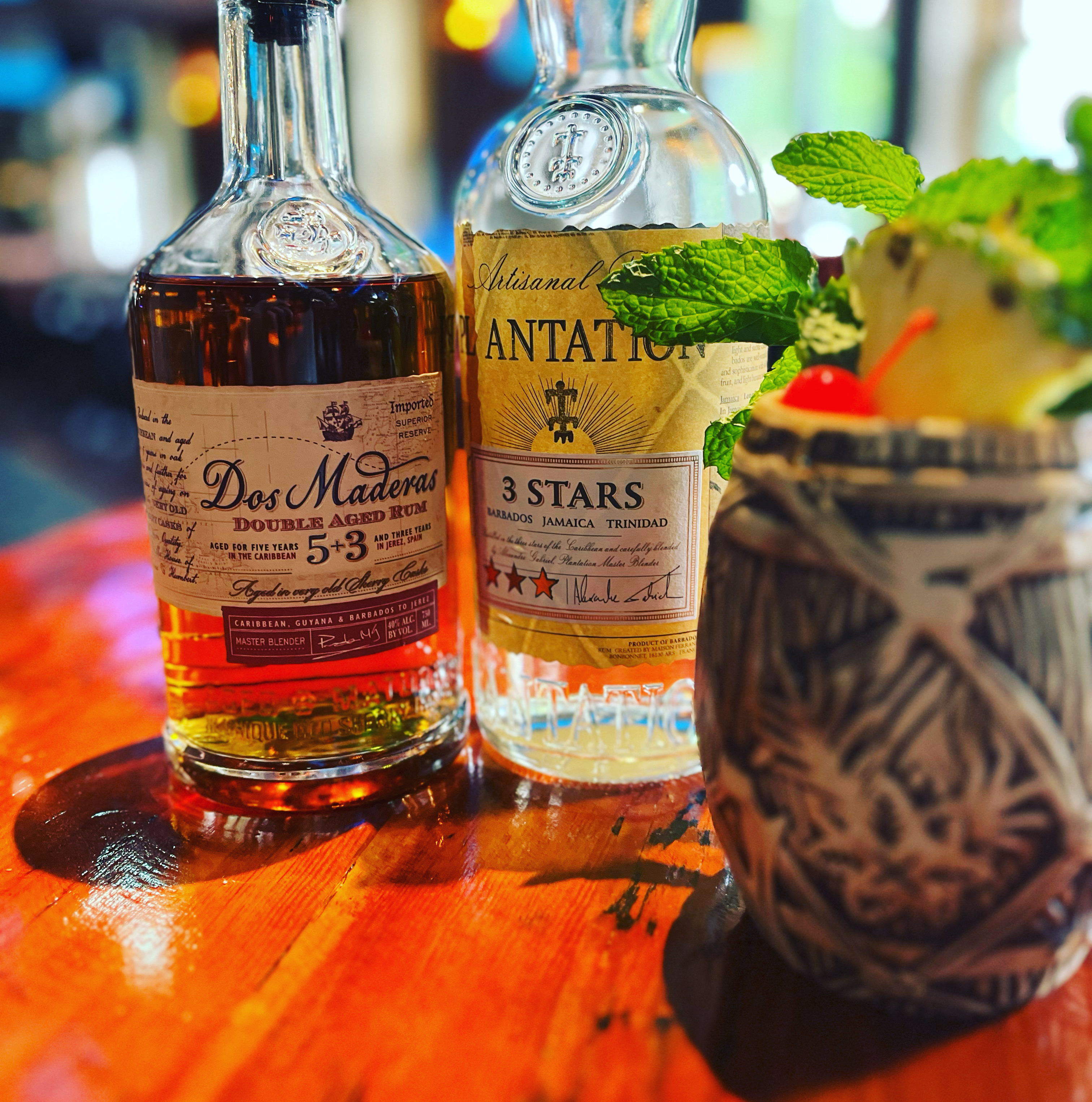 a group of glass bottles on a table