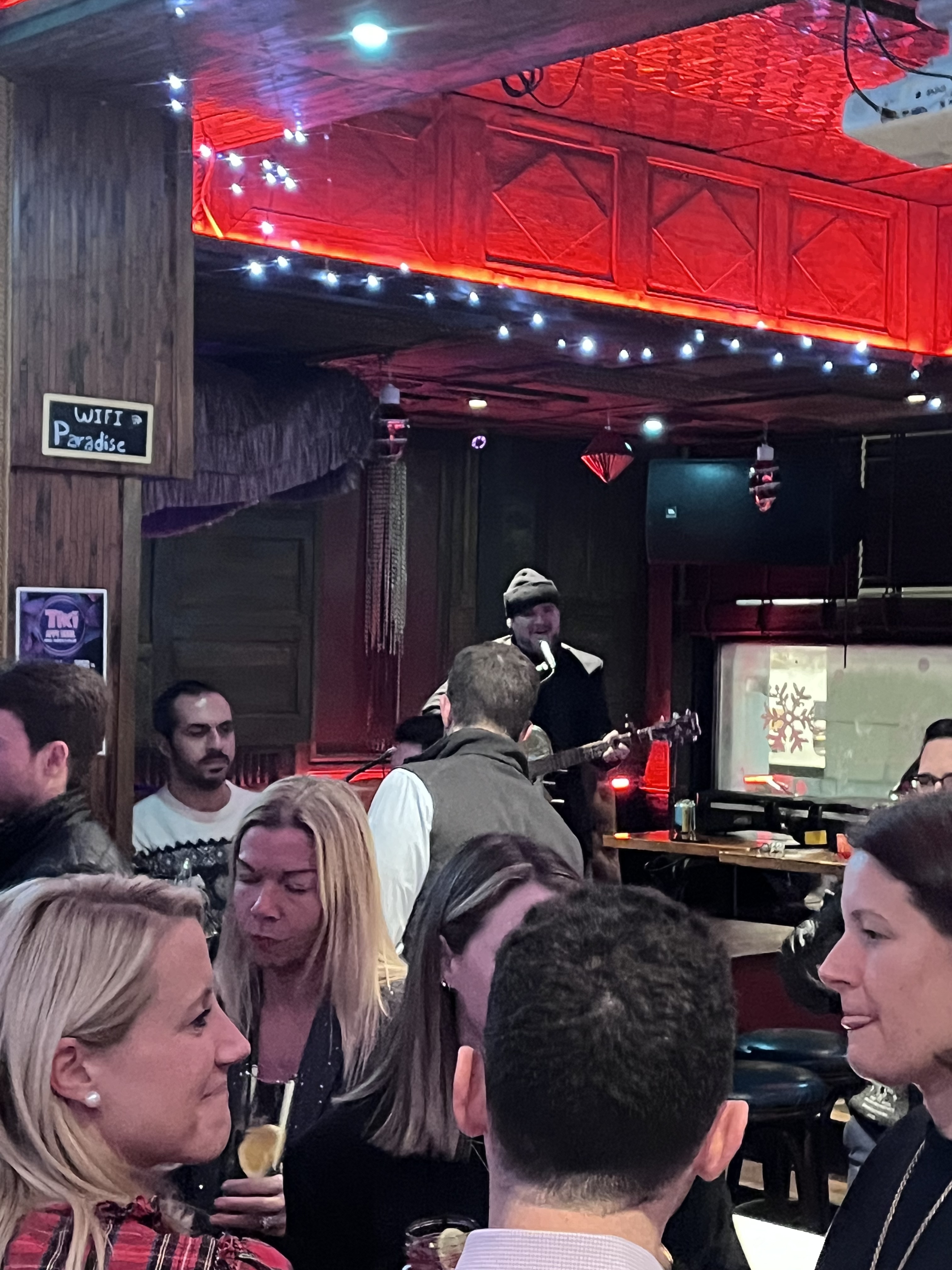 a group of people standing in front of a crowd