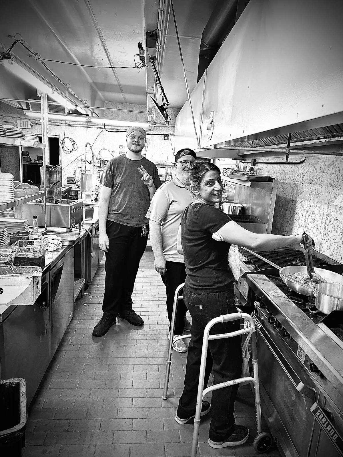 a man standing next to a boat