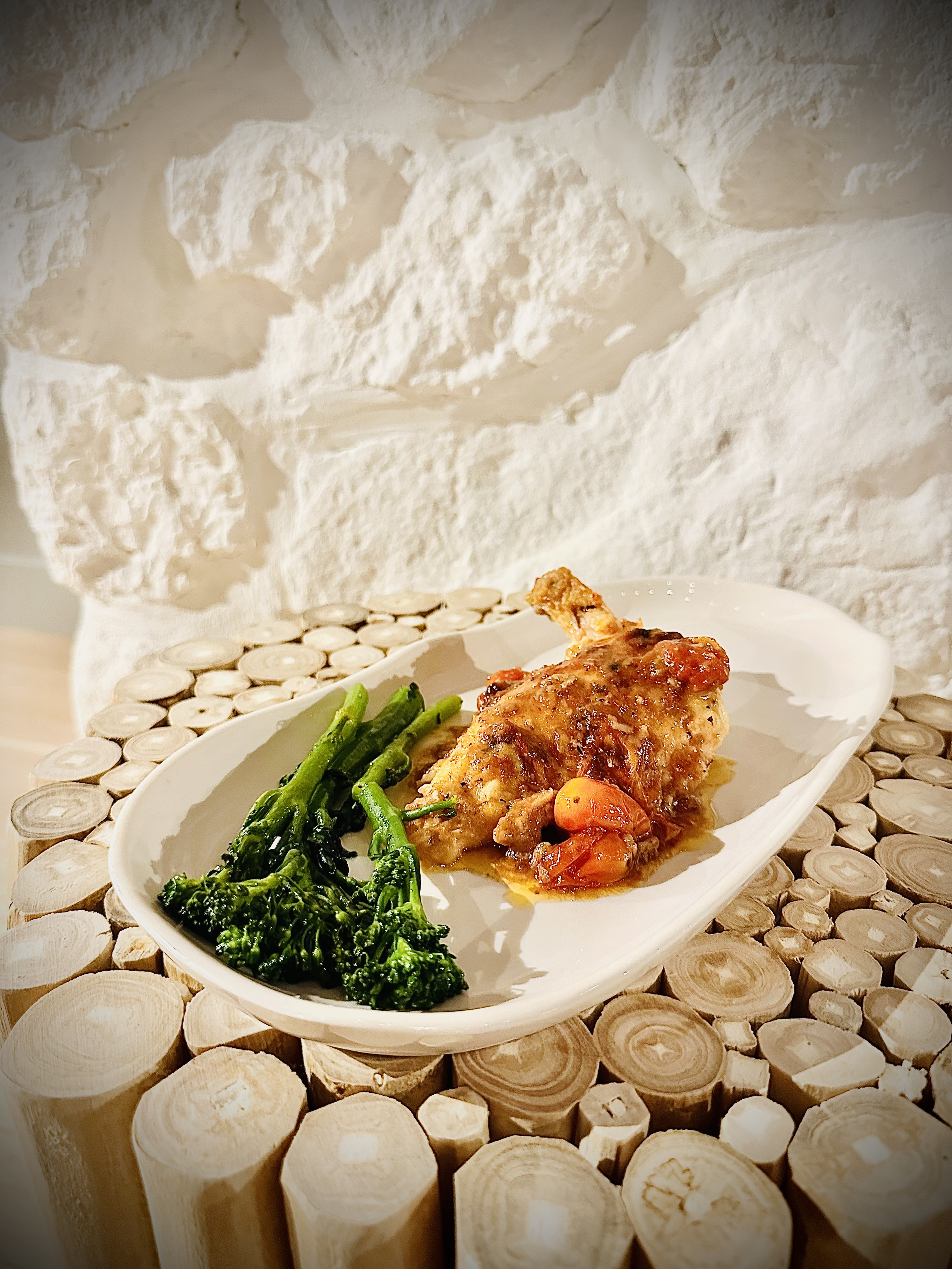 a plate of food with rice meat and vegetables