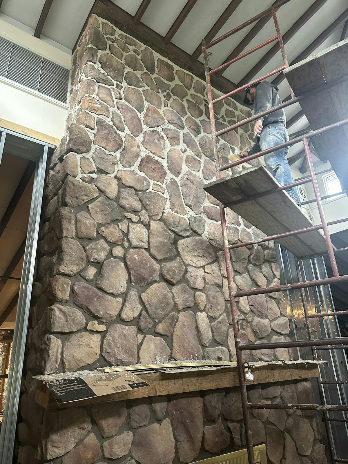 a stone building that has a brick wall