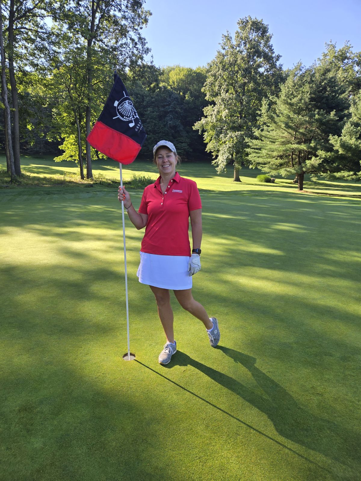 a person holding a golf club