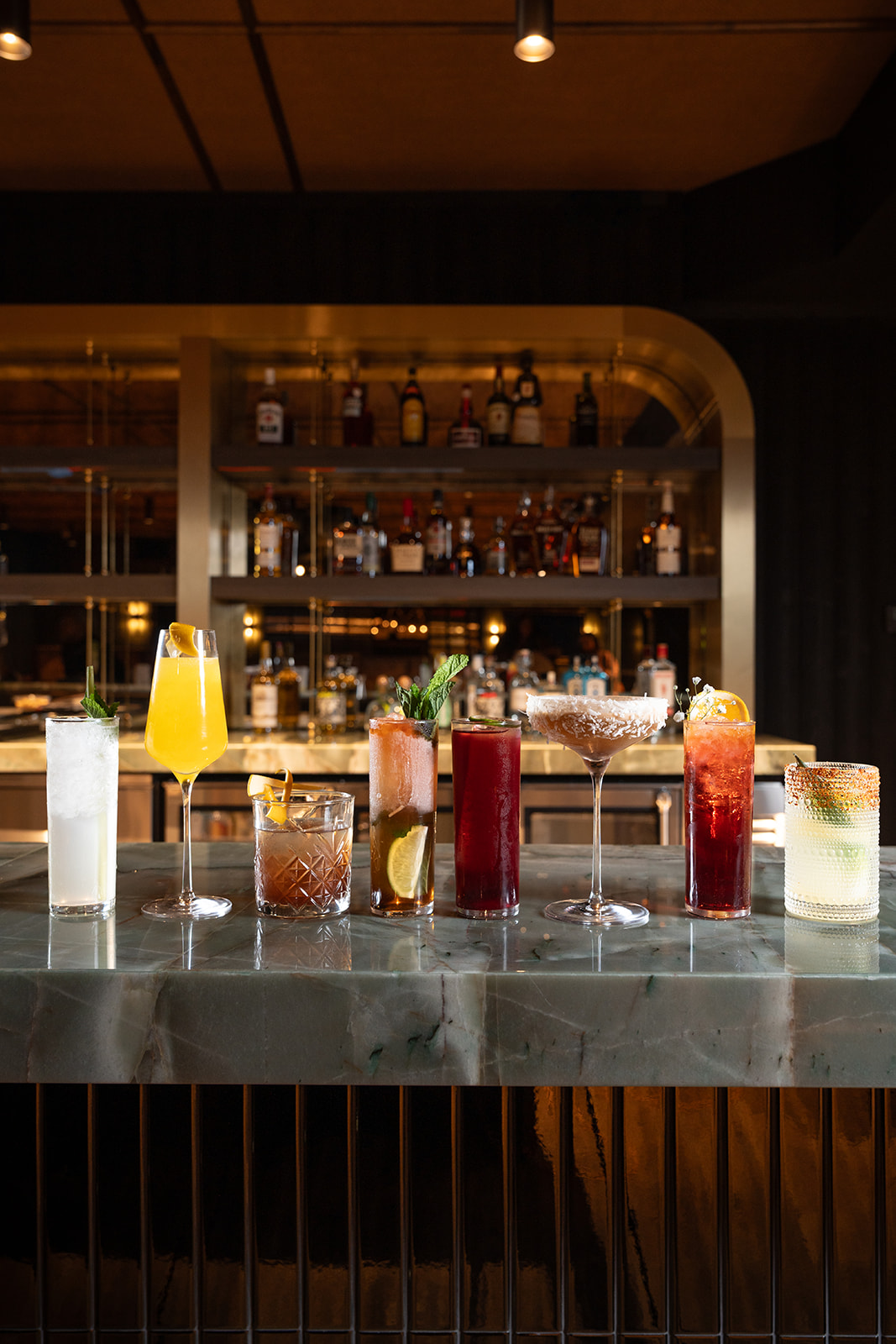 a bottle of wine and a glass display case