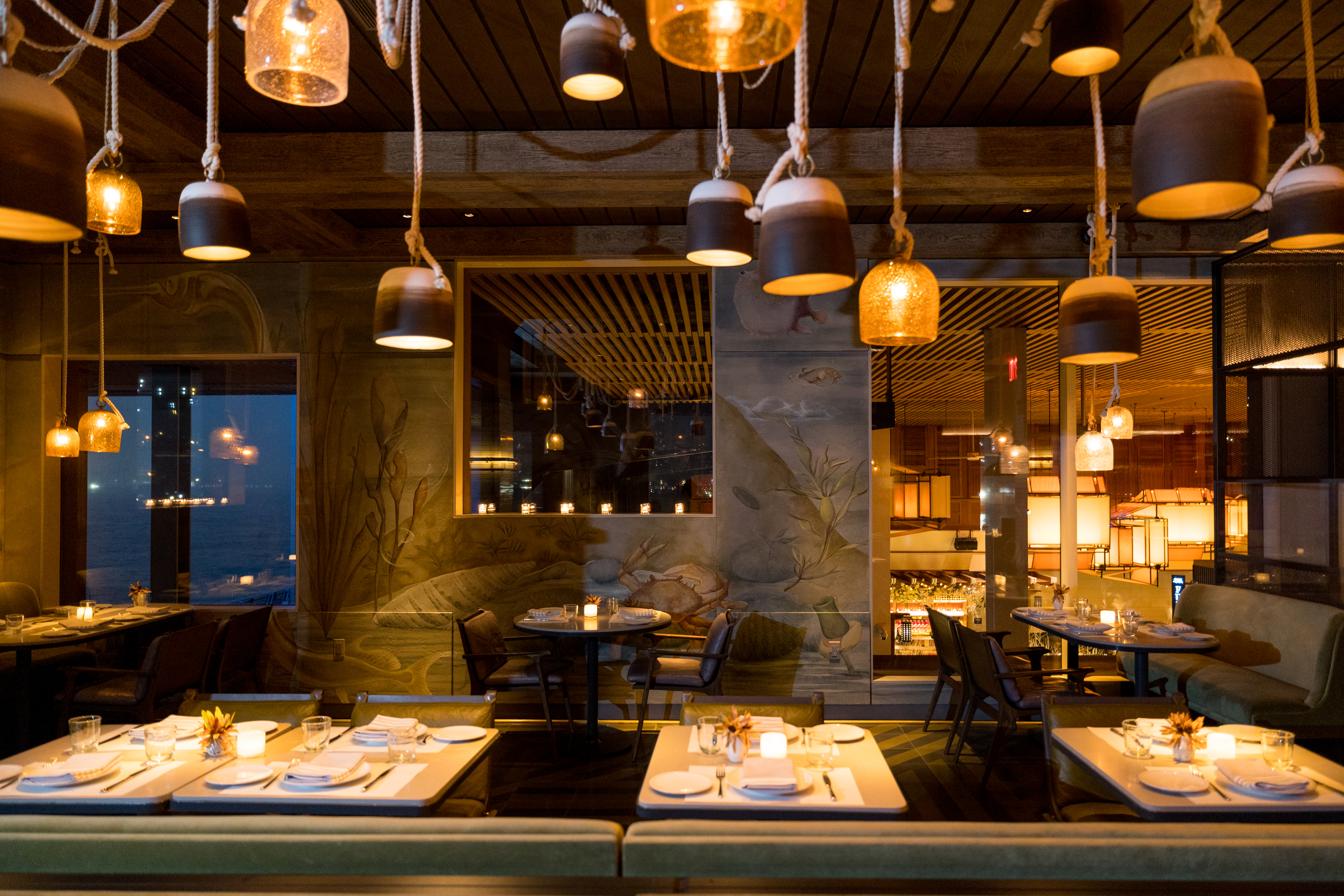 a kitchen with a table in a restaurant