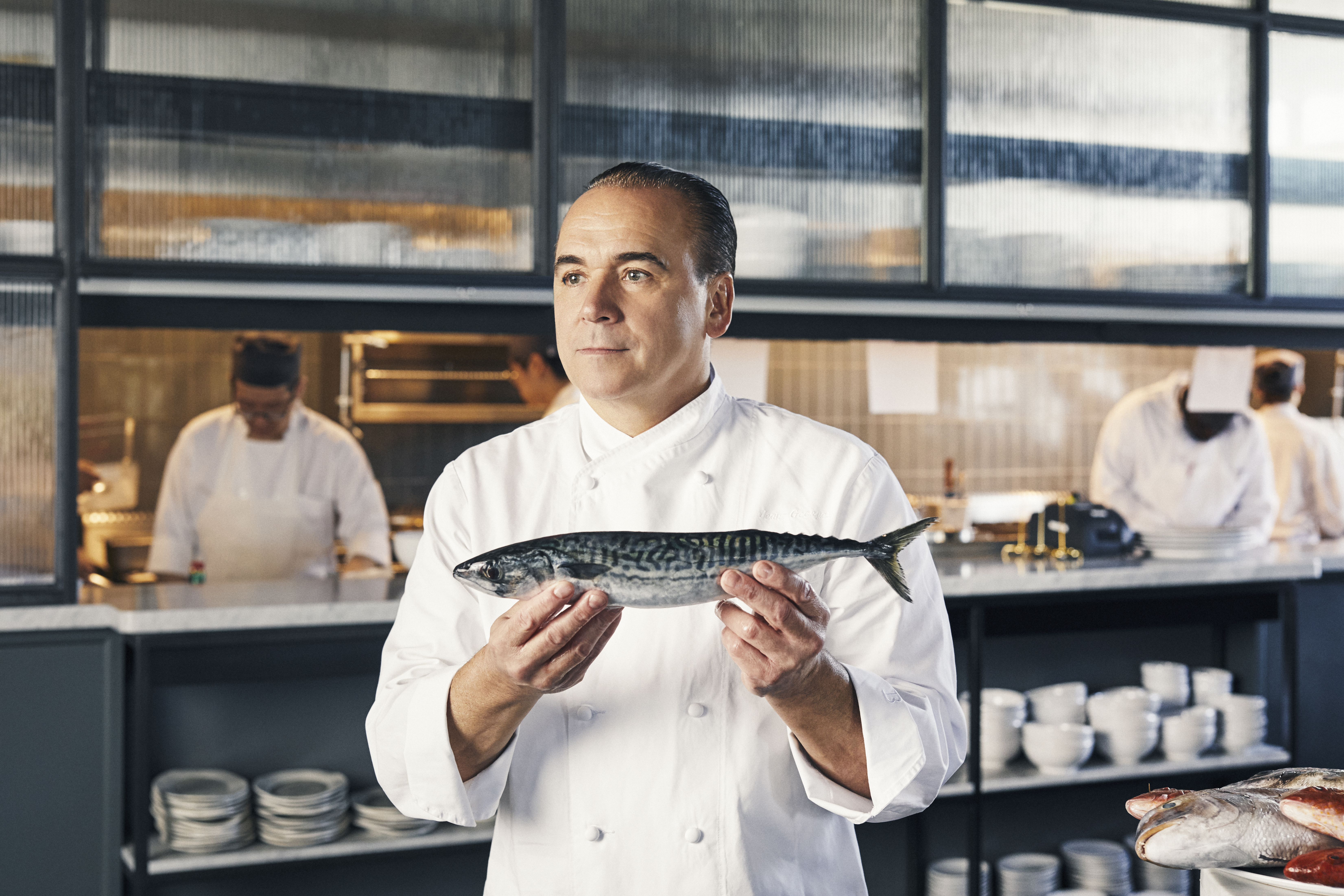 Jean-Georges Vongerichten holding a fish