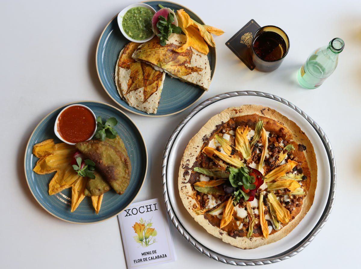 a bowl filled with different types of food on a plate