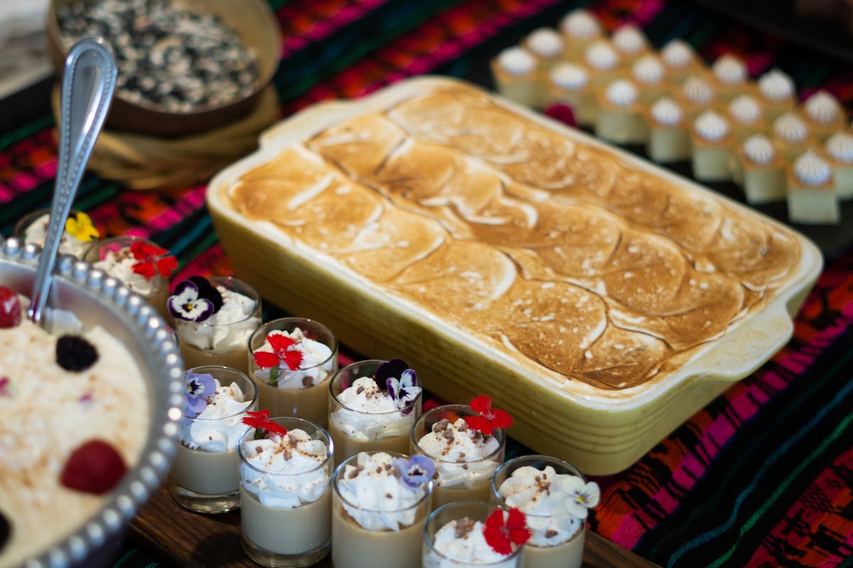 a cake with fruit on top of a table