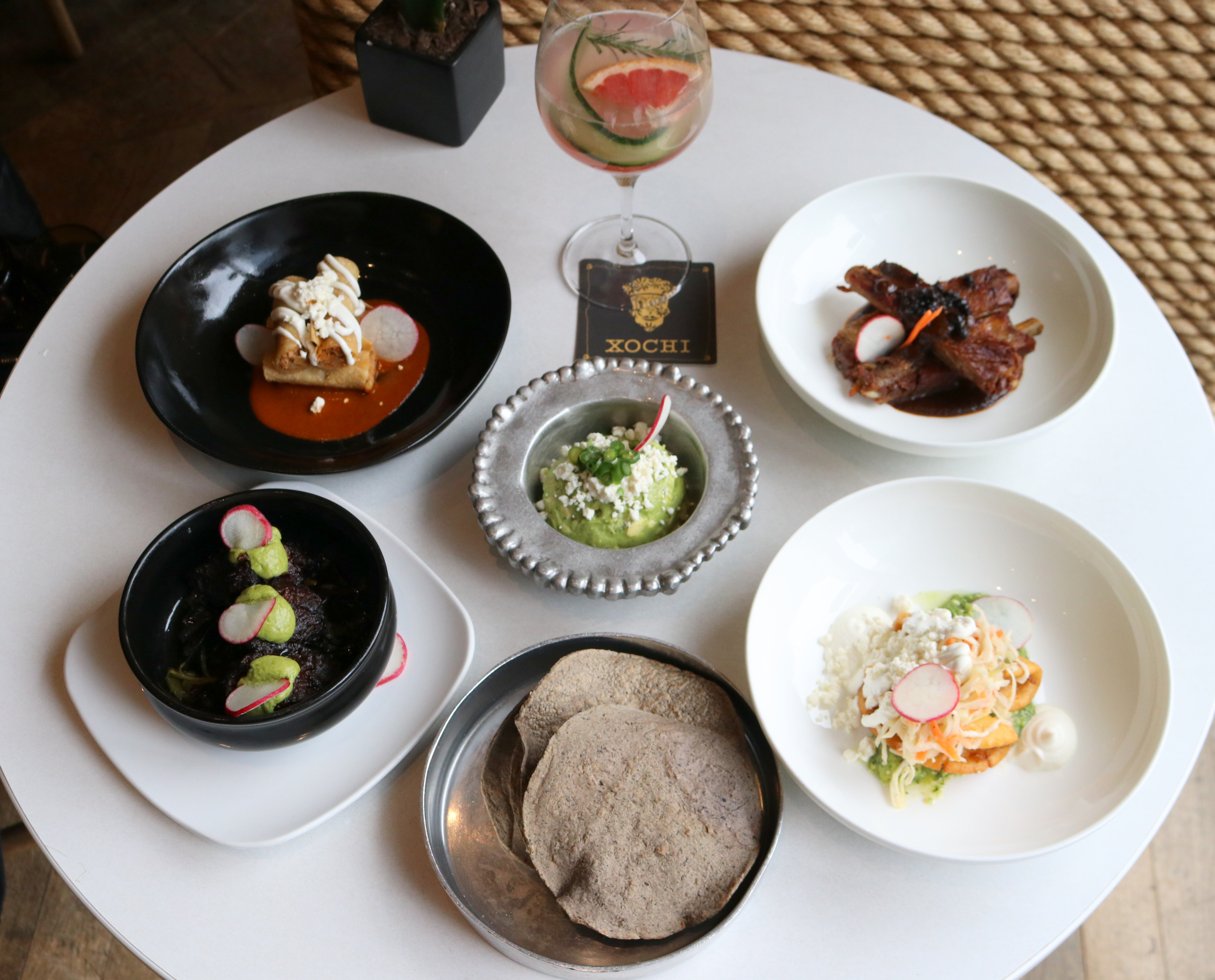 a bowl of food on a plate on a table