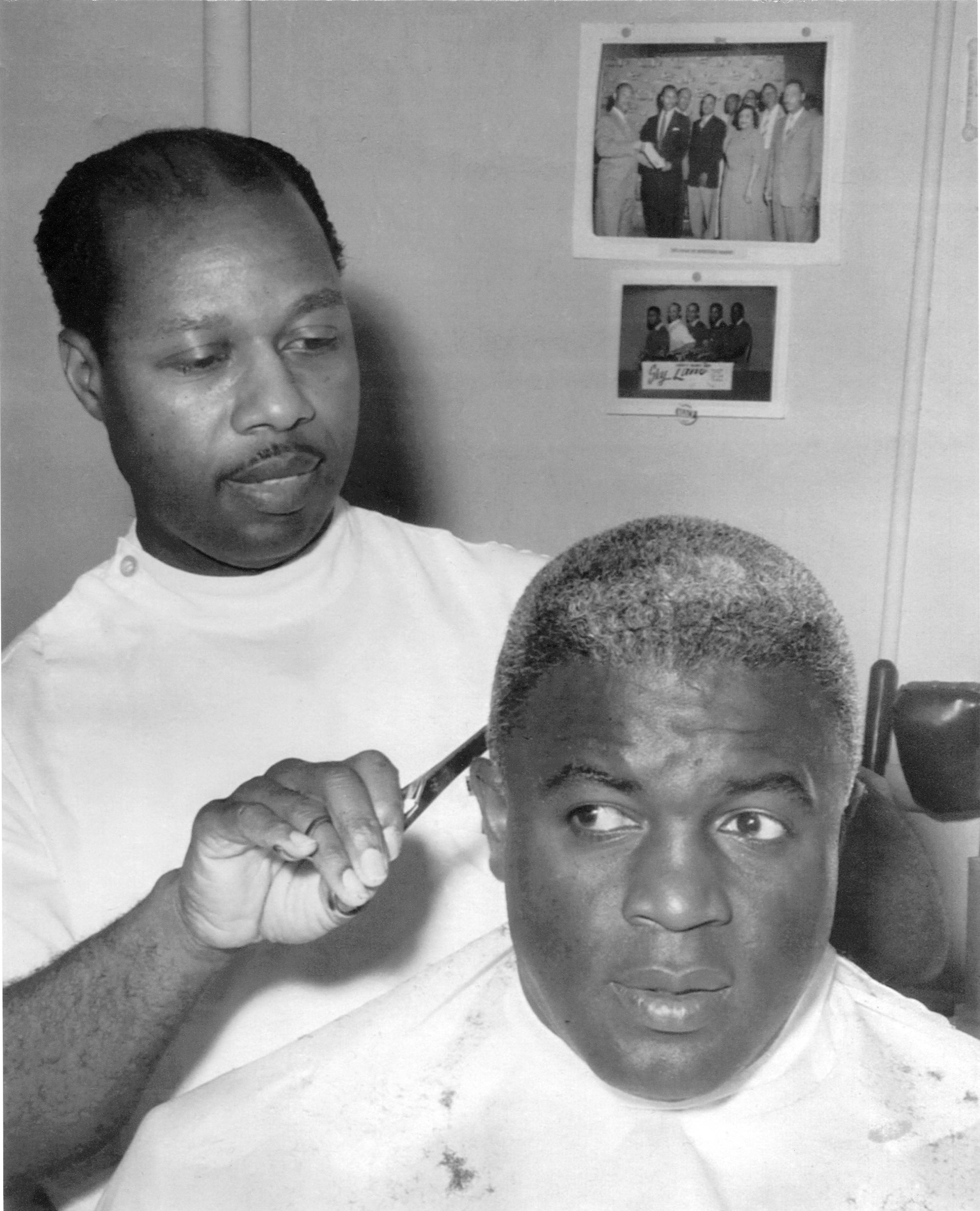 Jackie Robinson posing for a photo