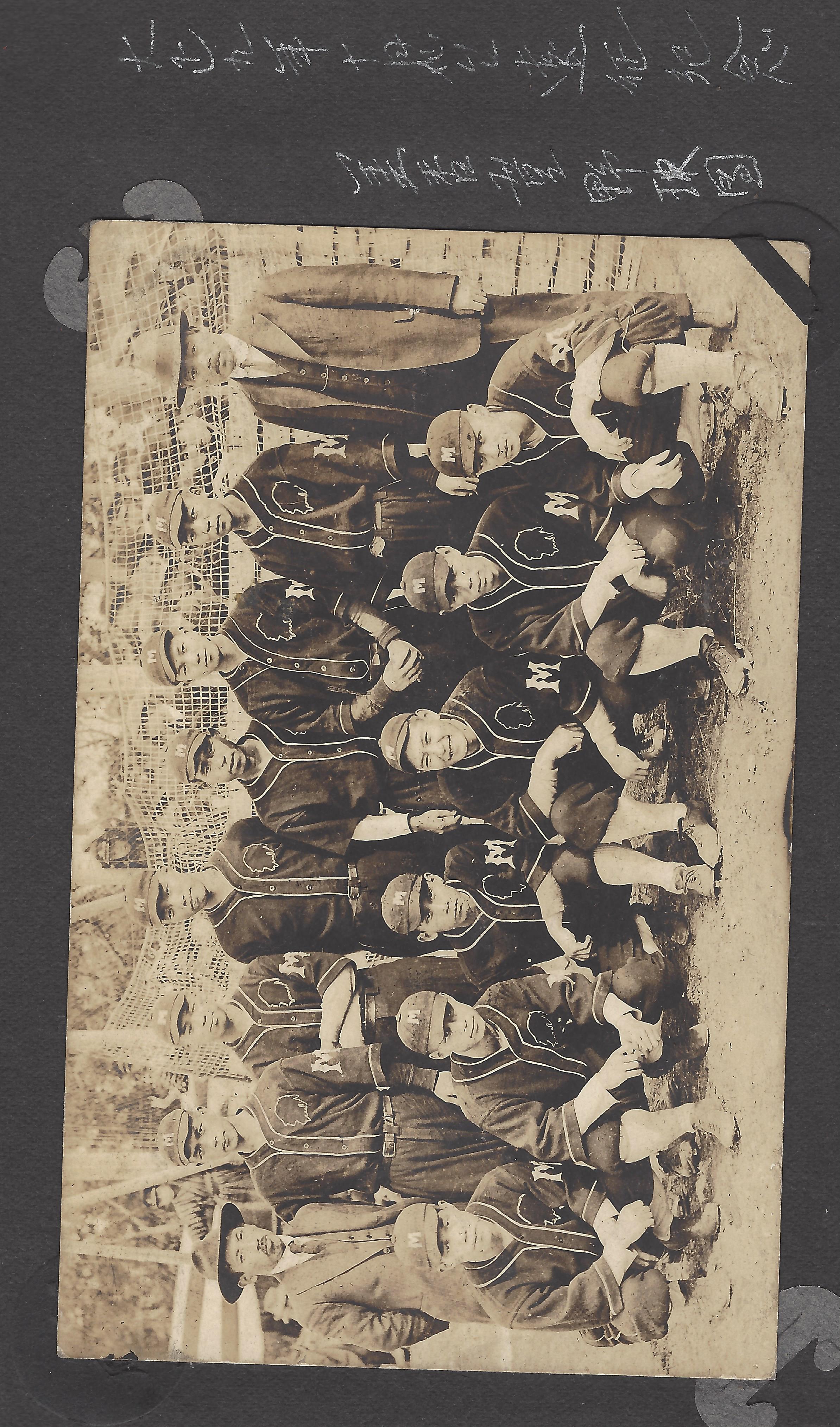 a group of men posing for a photo