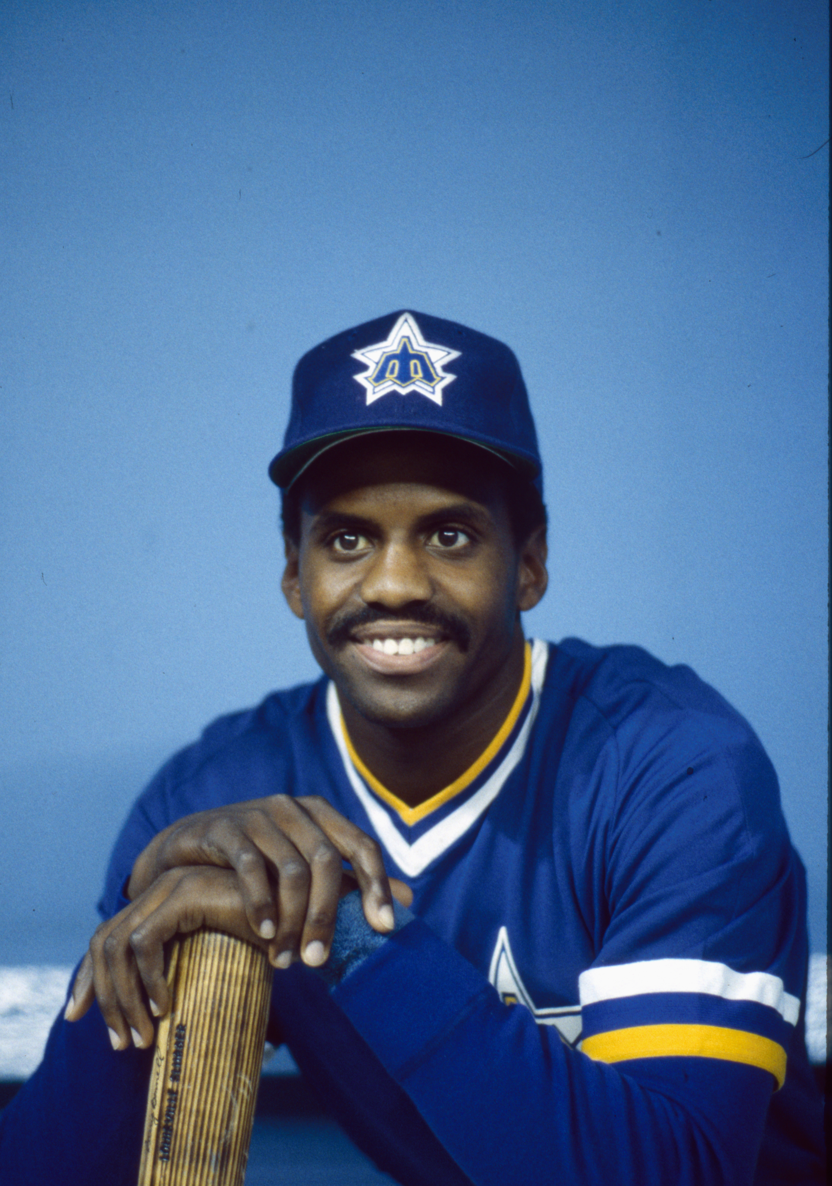 a boy wearing a blue hat