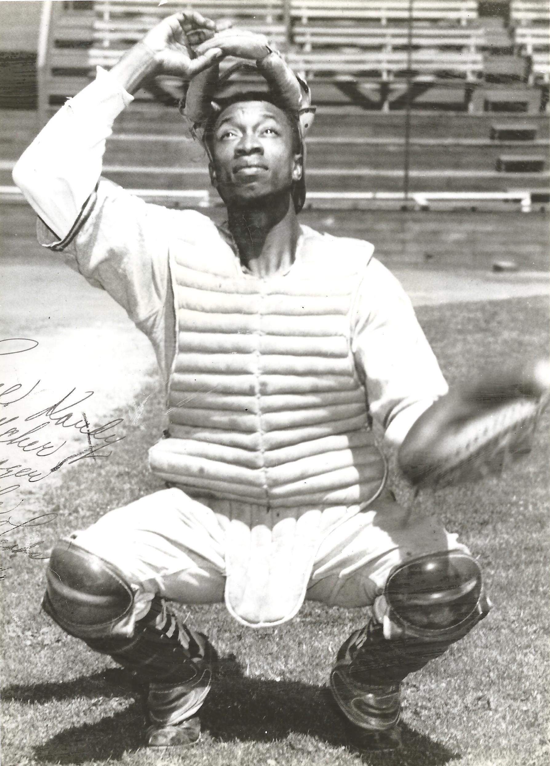 a man sitting in a field
