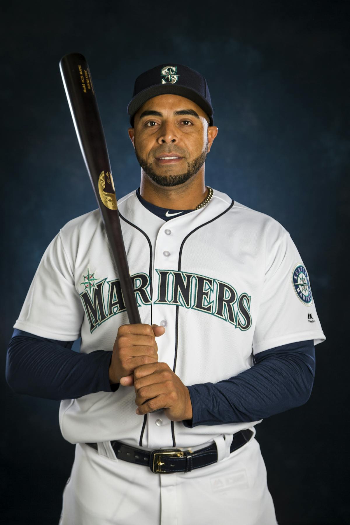Nelson Cruz wearing a uniform and holding a baseball bat