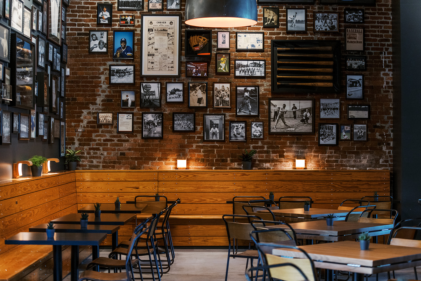 a group of people sitting at a table in a restaurant