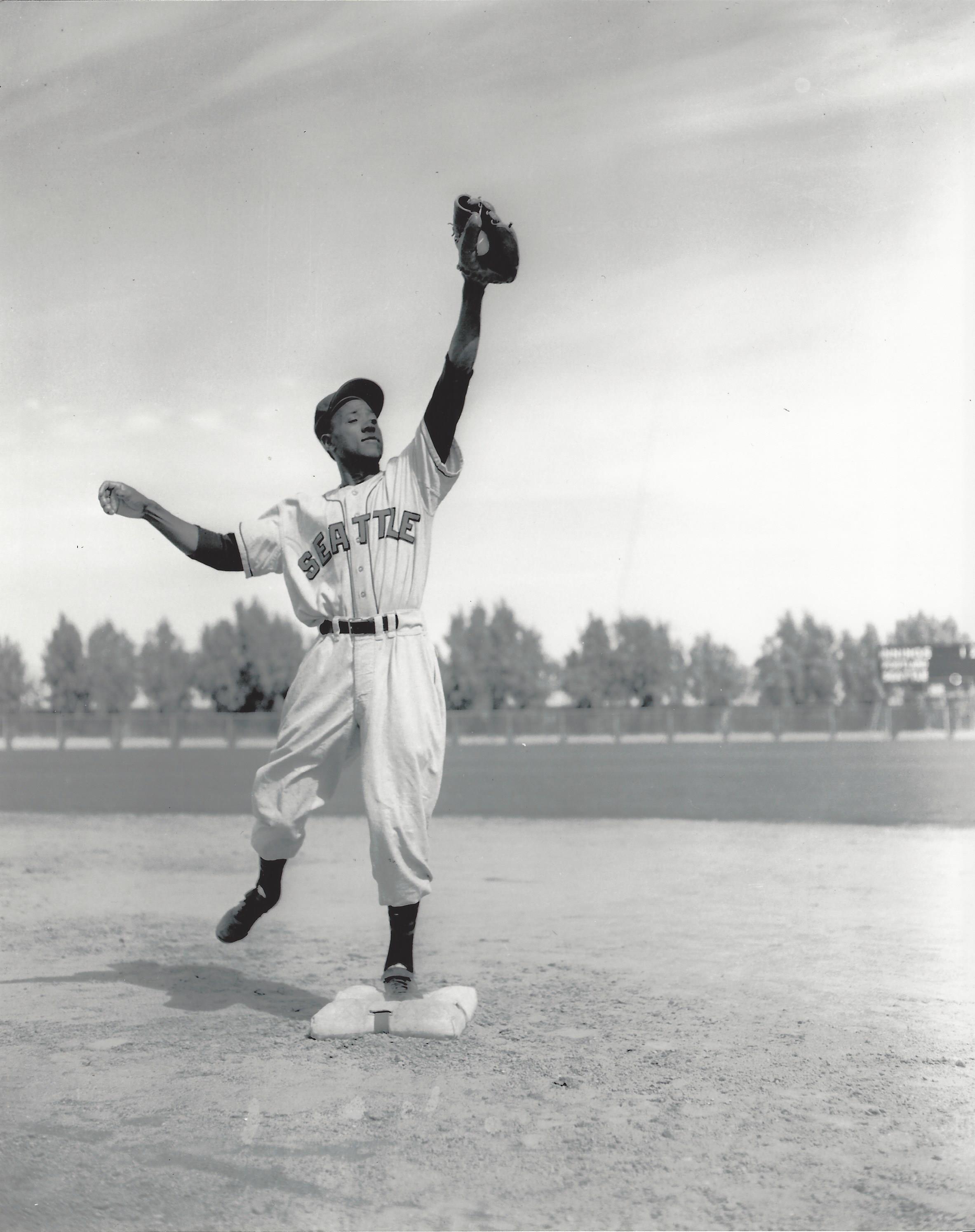 a man standing on a baseball field