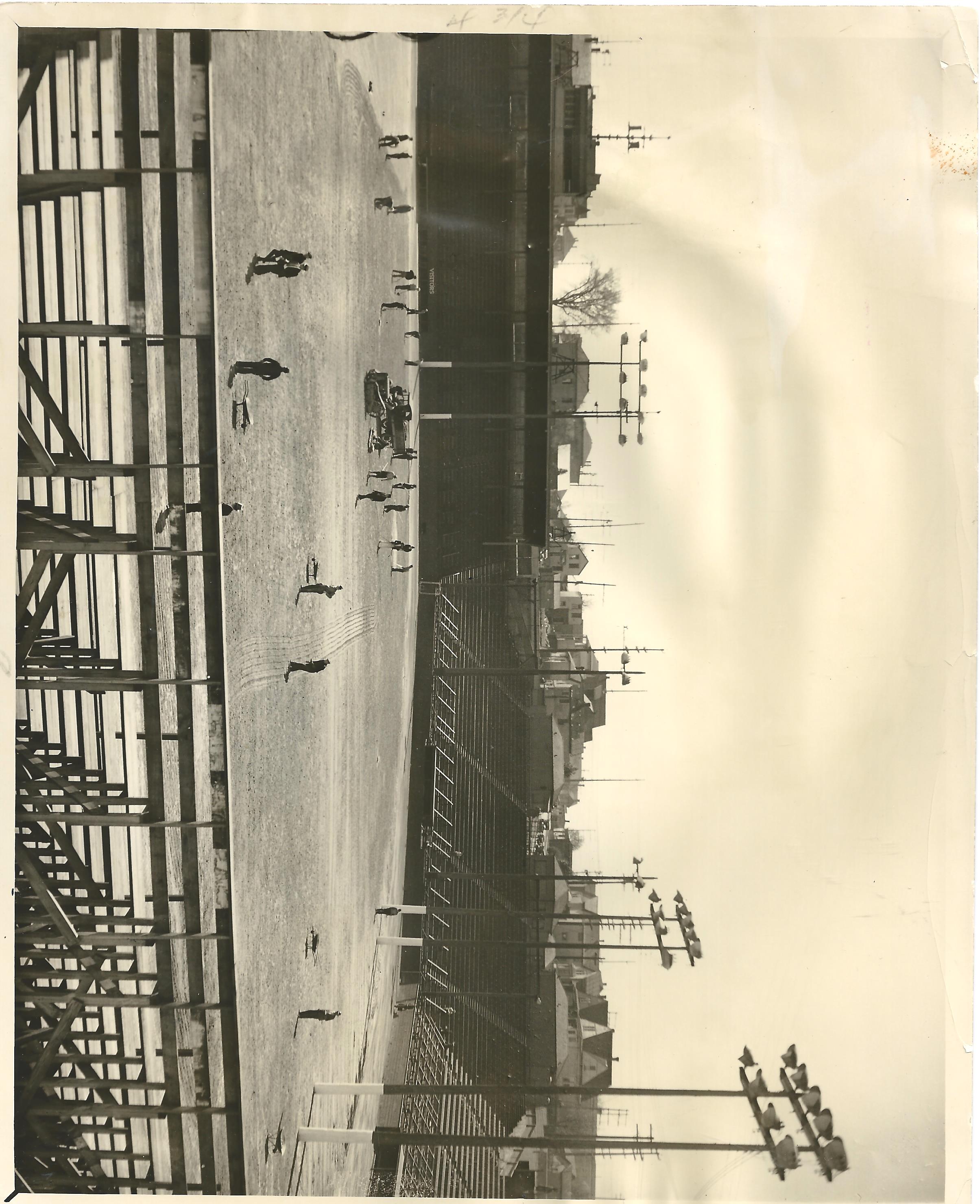 a group of people standing in front of a pier