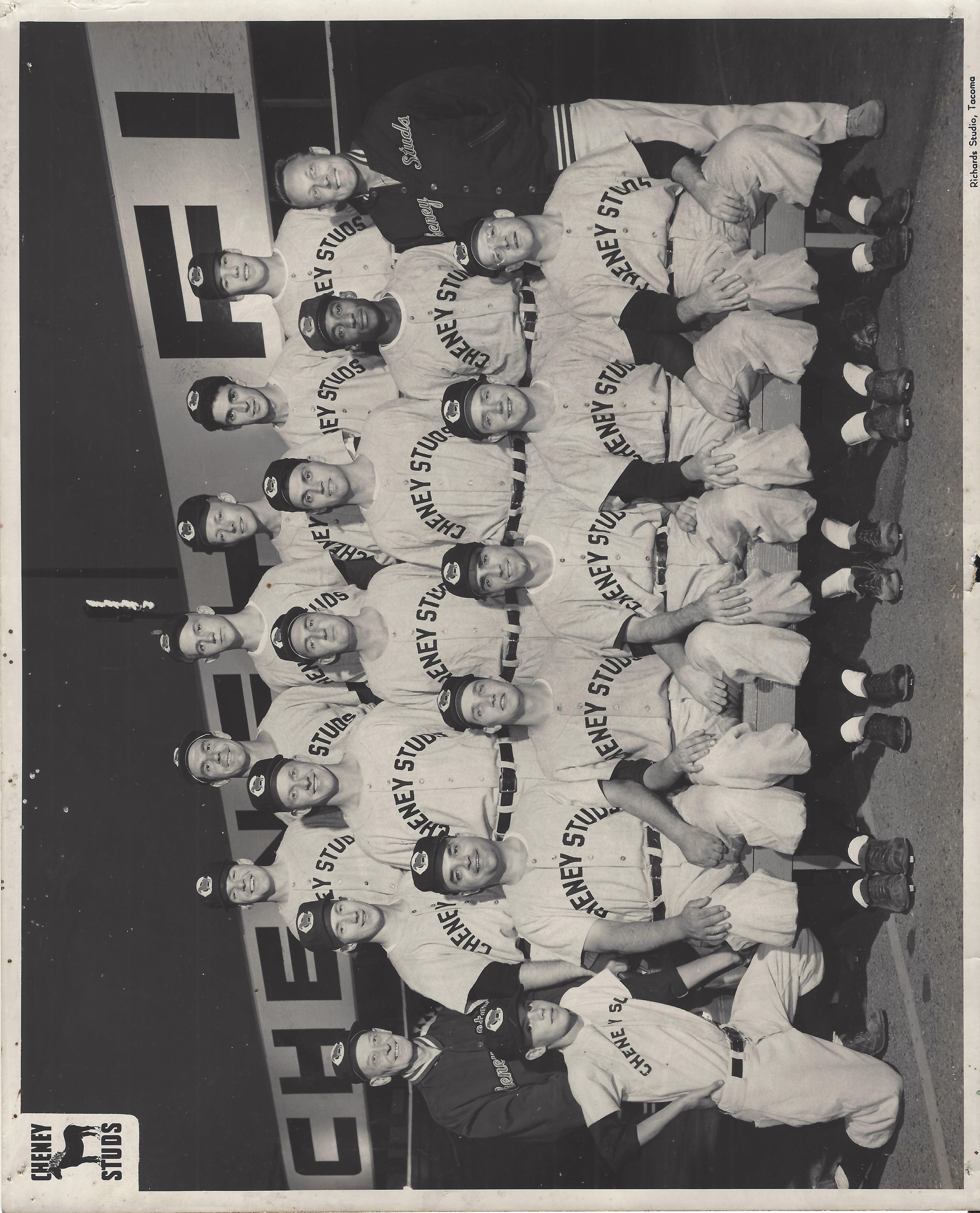a group of men posing for a photo