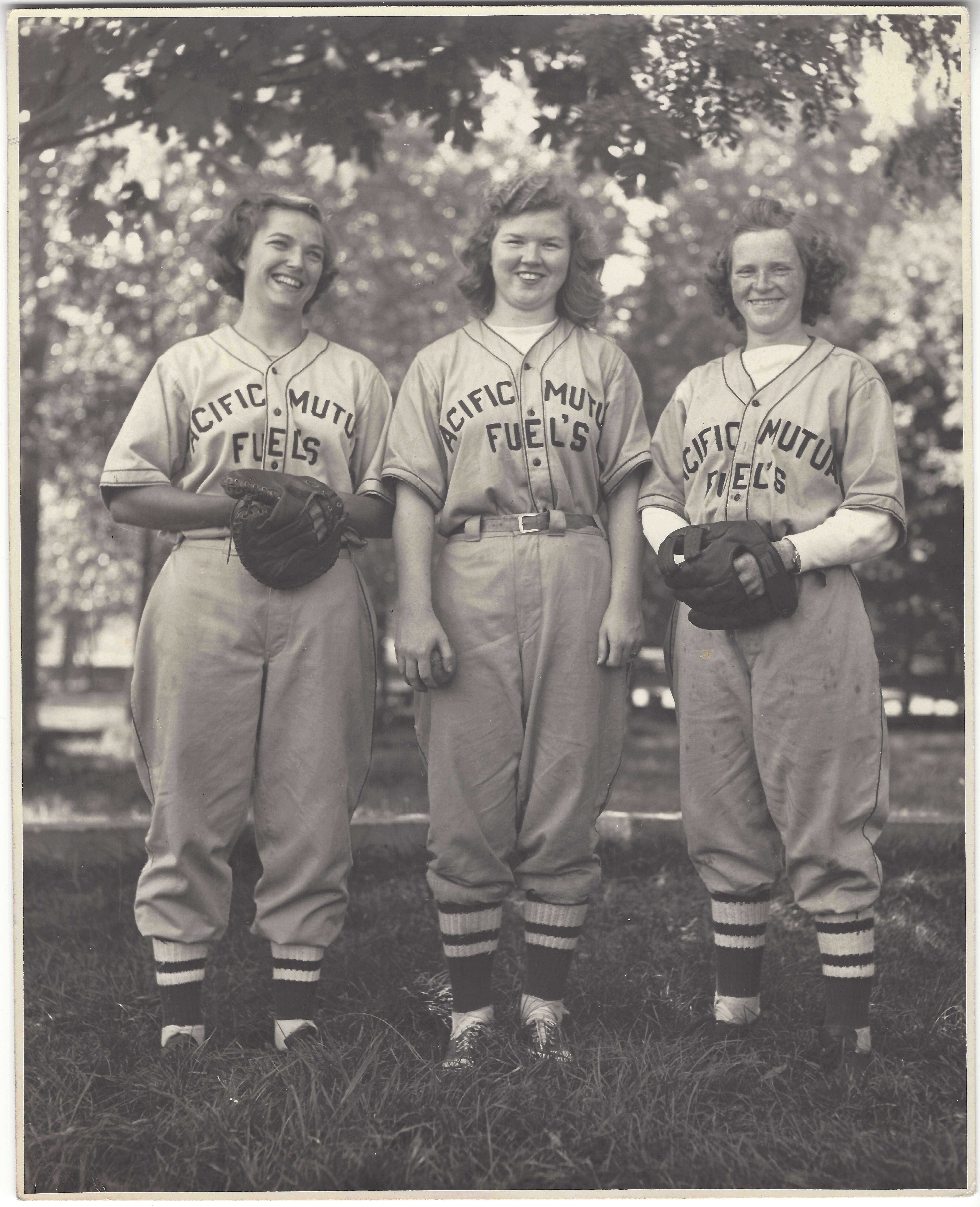 a group of baseball players posing for a photo