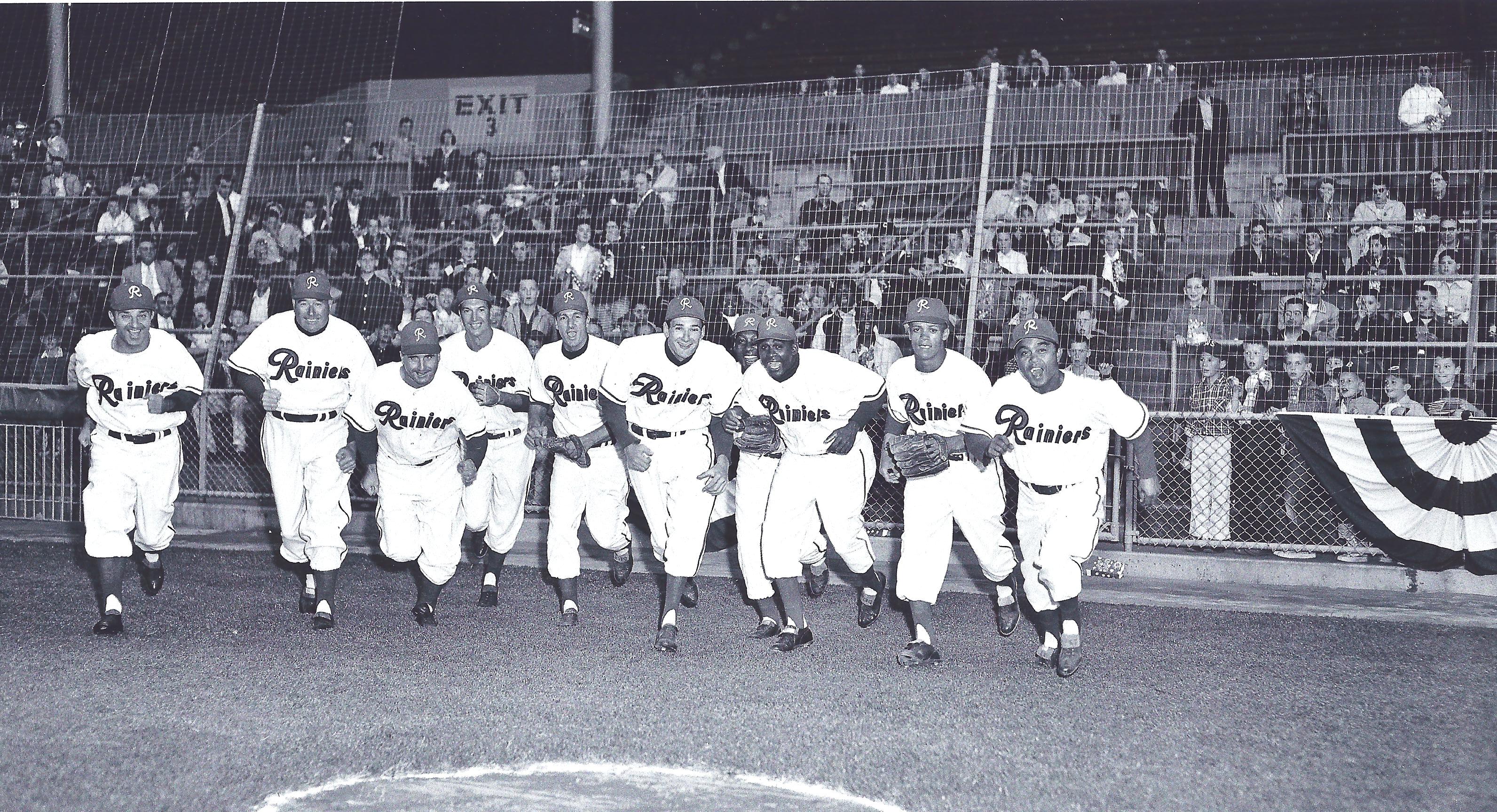 a vintage photo of a group of people posing for the camera