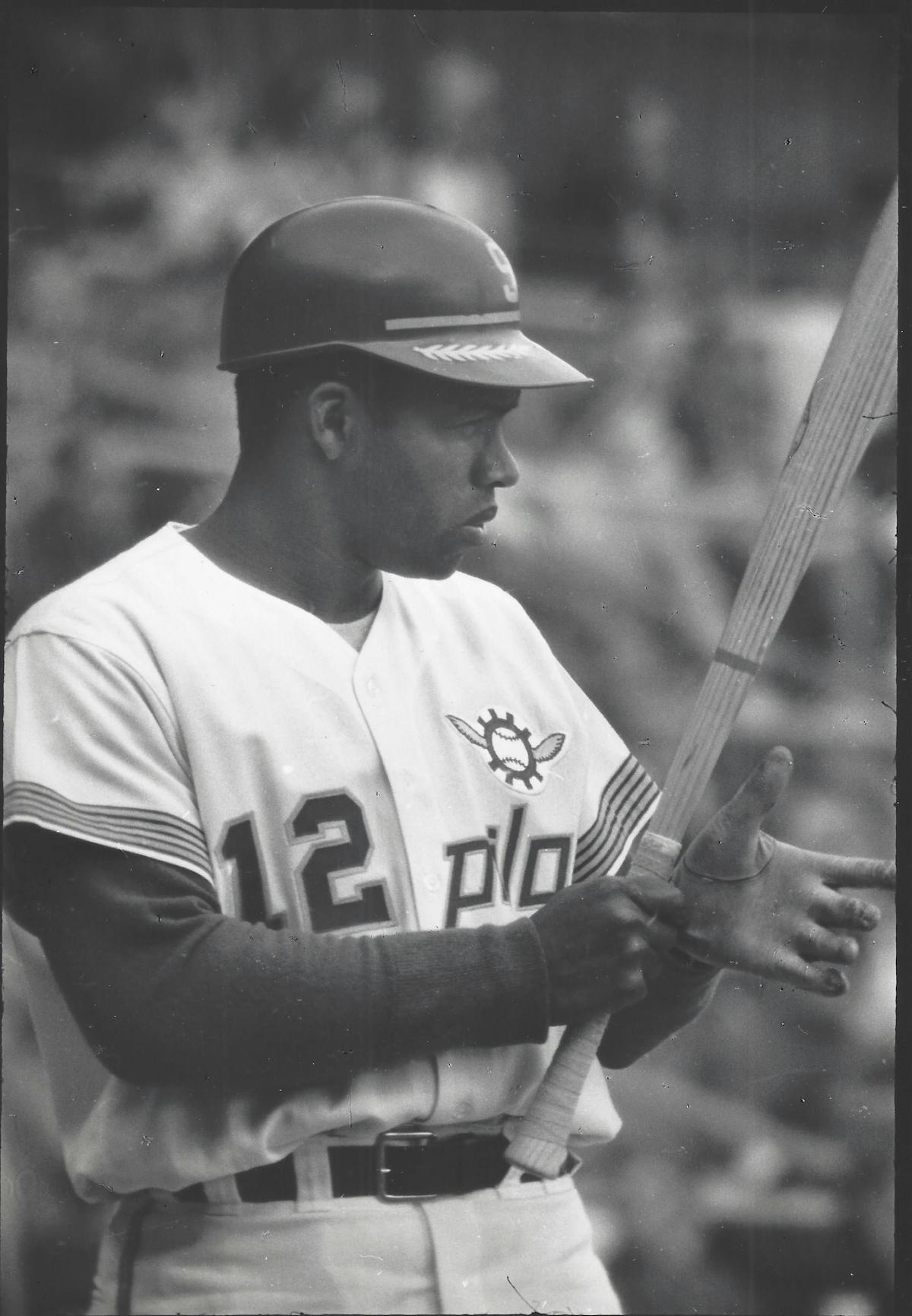a man holding a baseball bat