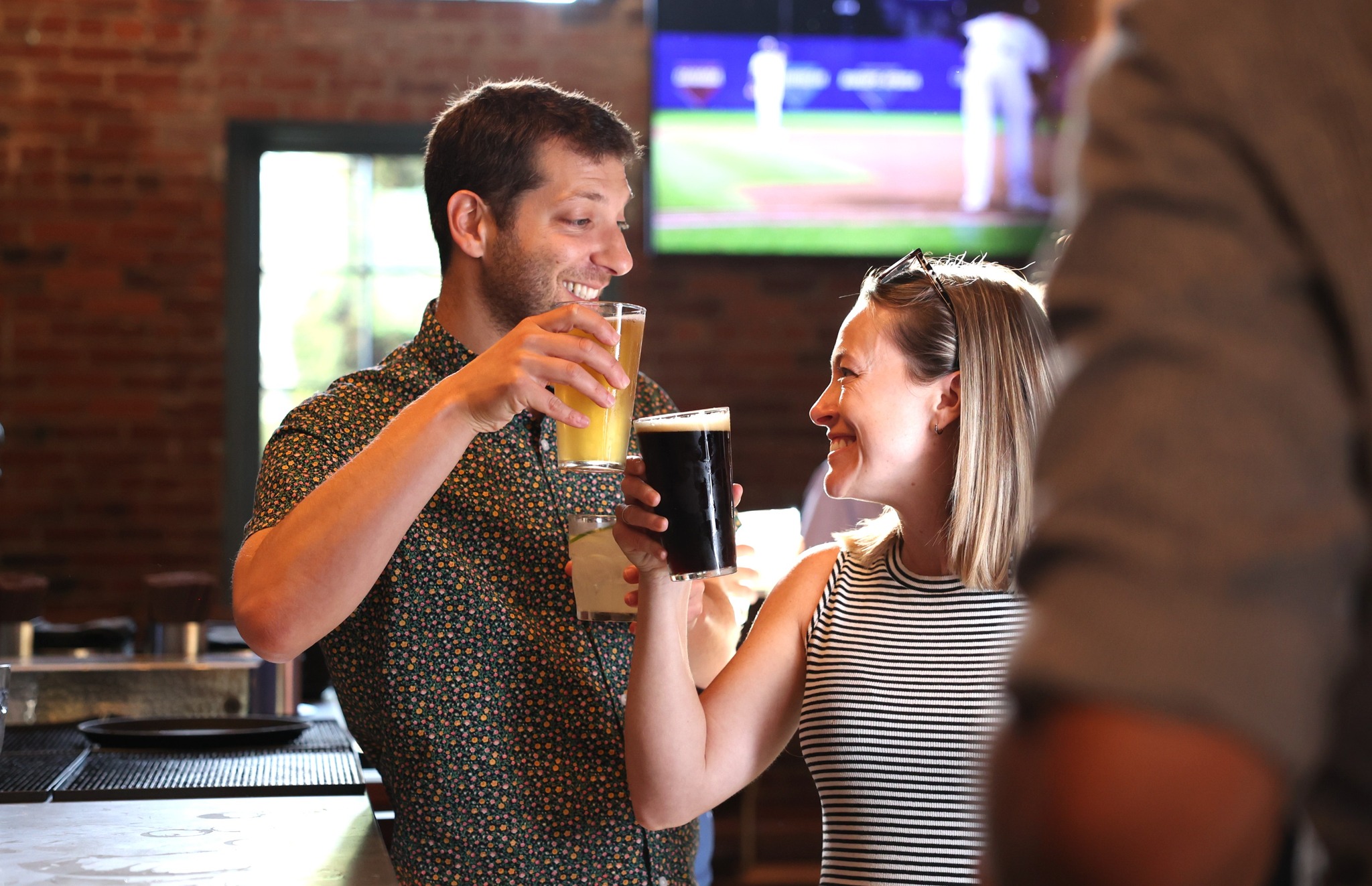 a person drinking from a bottle