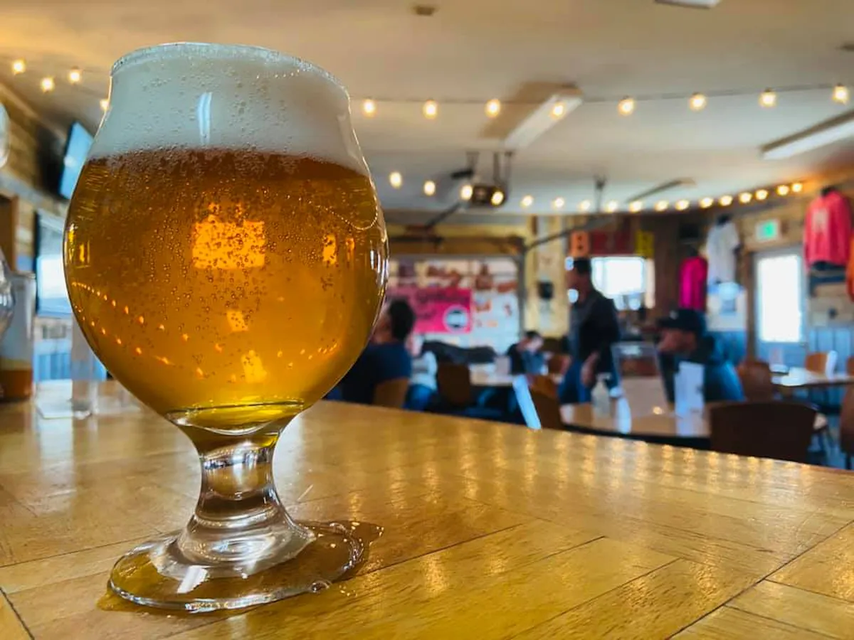 a glass of beer on a table