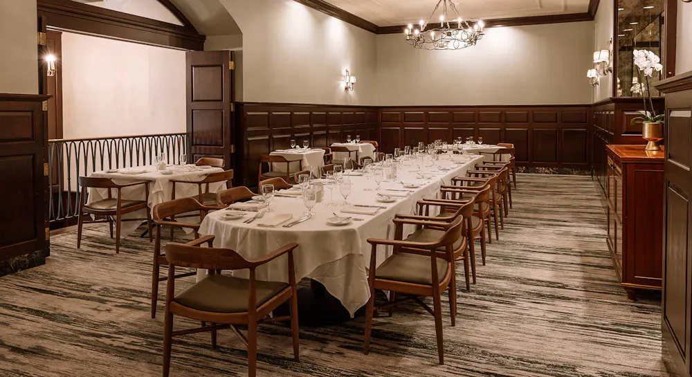 a large table set for a dinner party