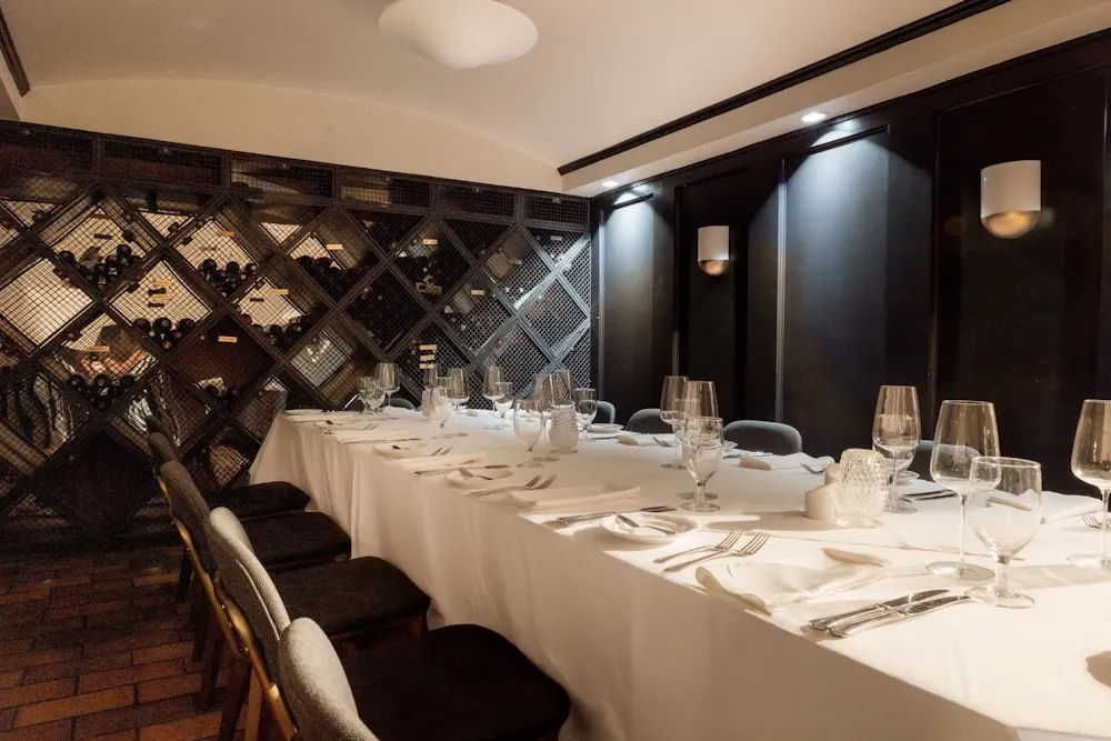 a large table set for a dinner party