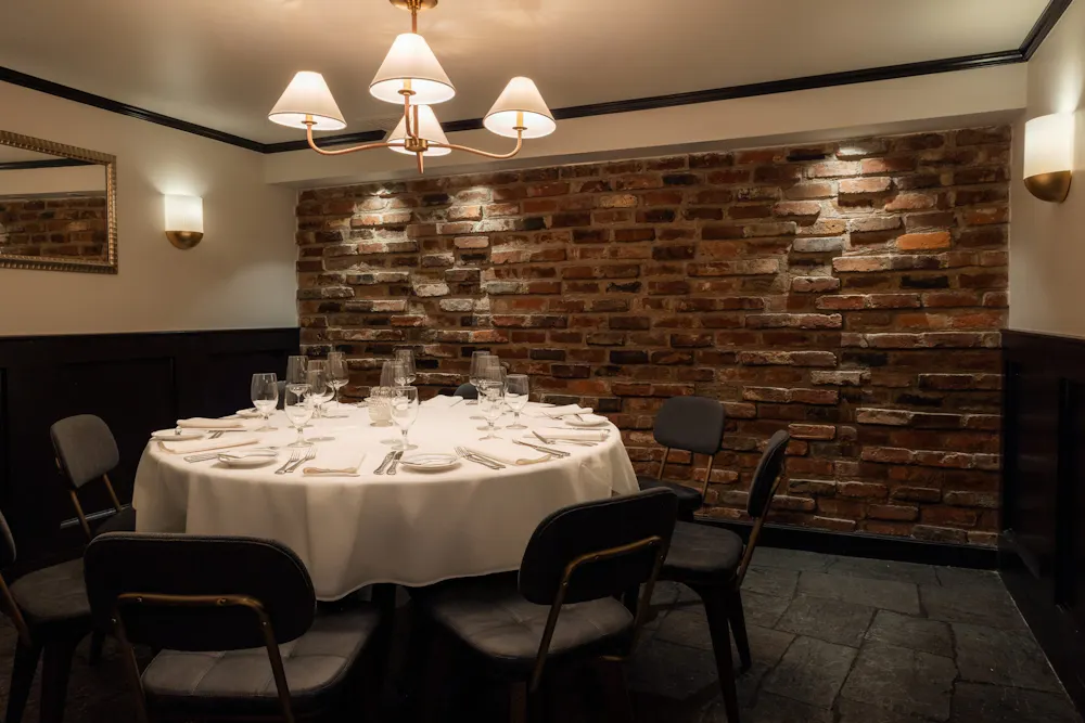 a large table set for a dinner party