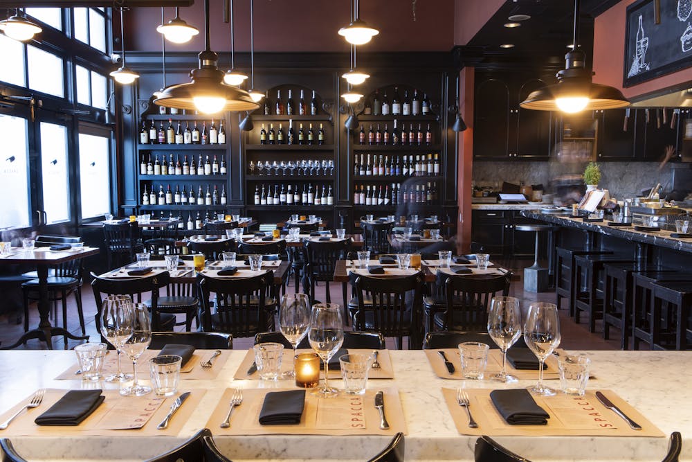 a kitchen with a table in a restaurant