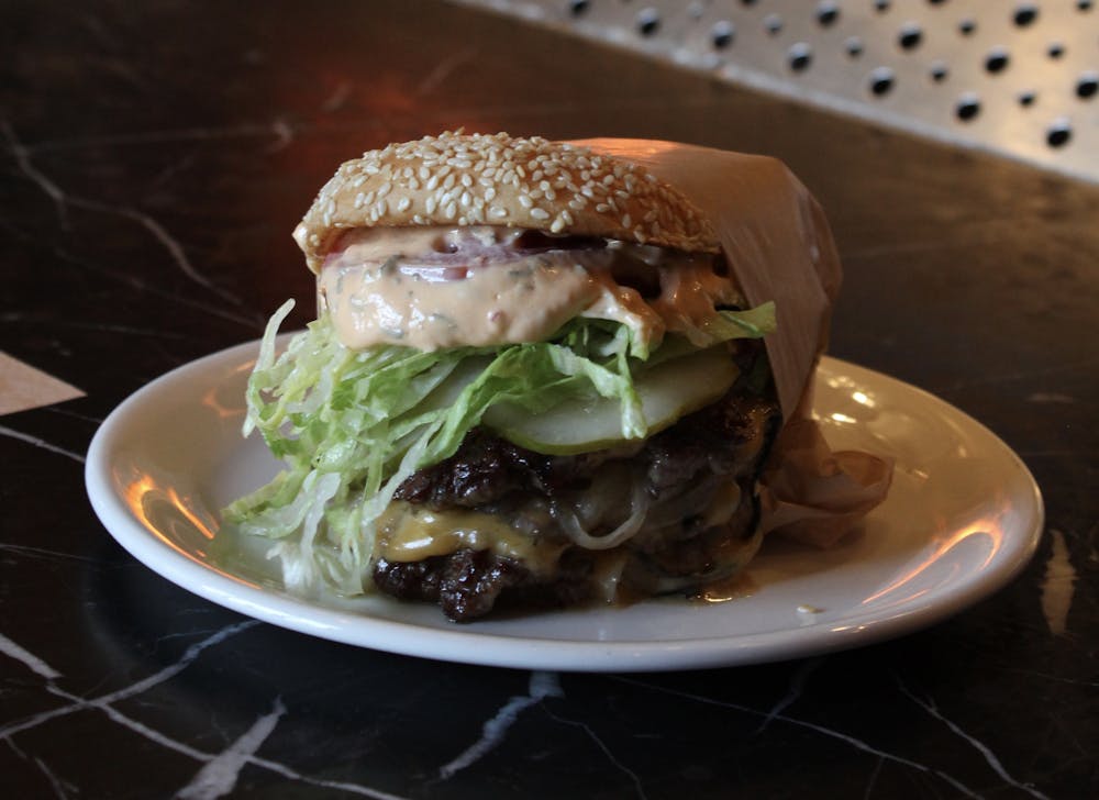 a sandwich sitting on top of a plate of food