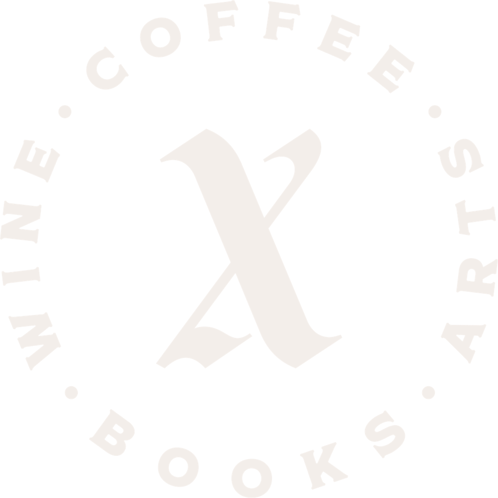 a white letter x in a circle with white text