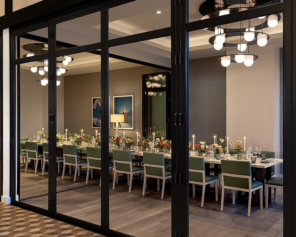 a dining room table in front of a building