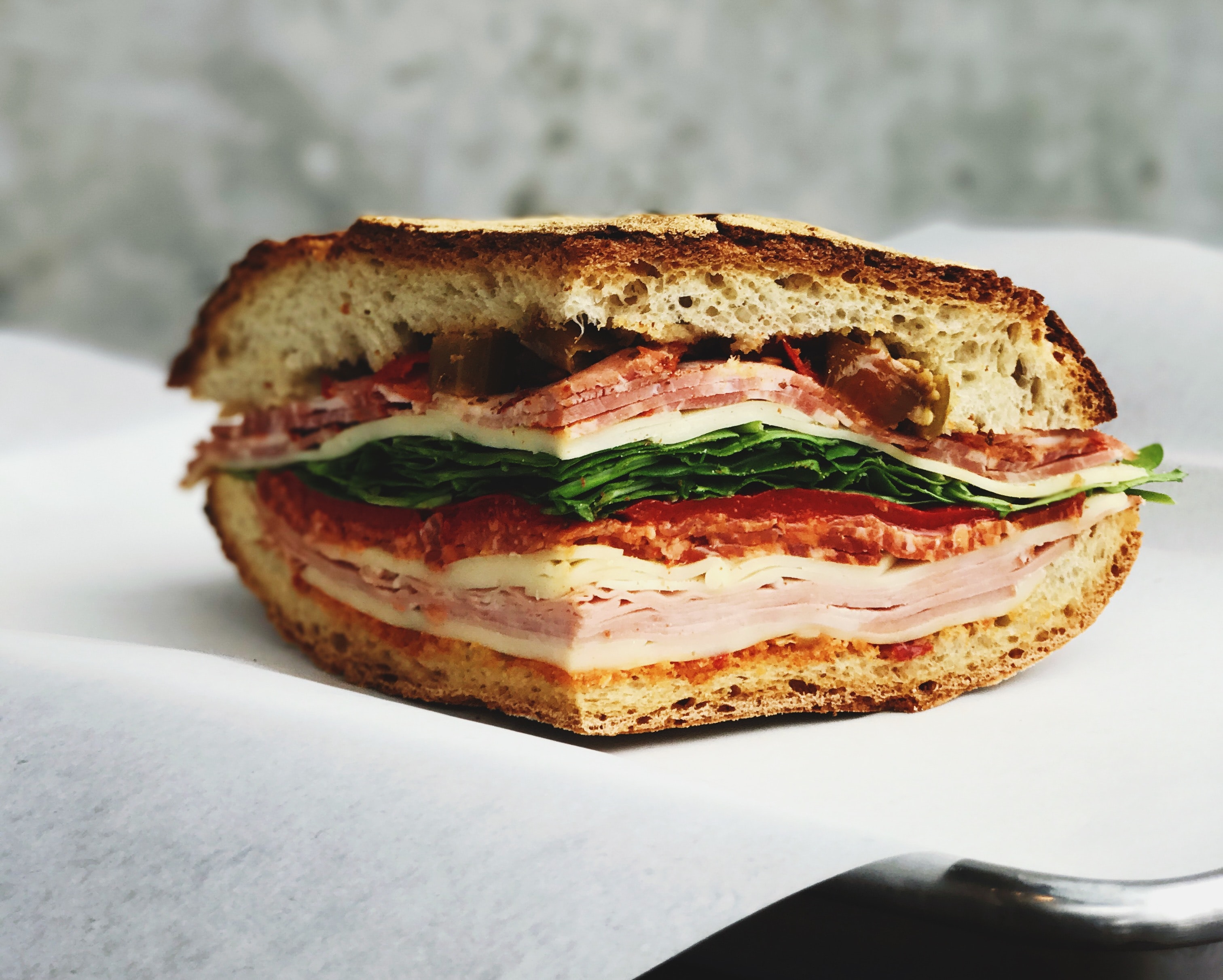 a sandwich cut in half on a plate